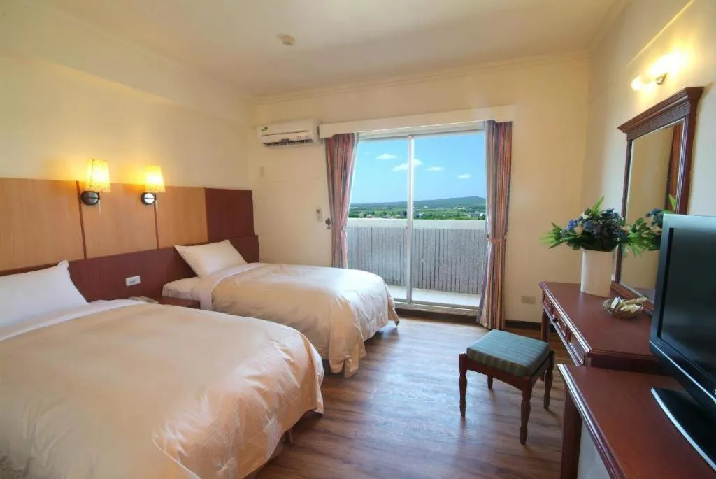 Bed in Kenting Holiday Hotel- Pet-friendly