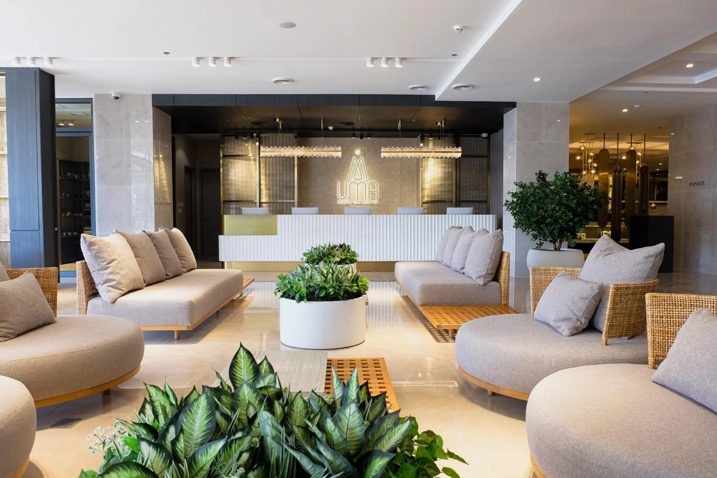 Lobby or reception in Uma Hotel and Residences