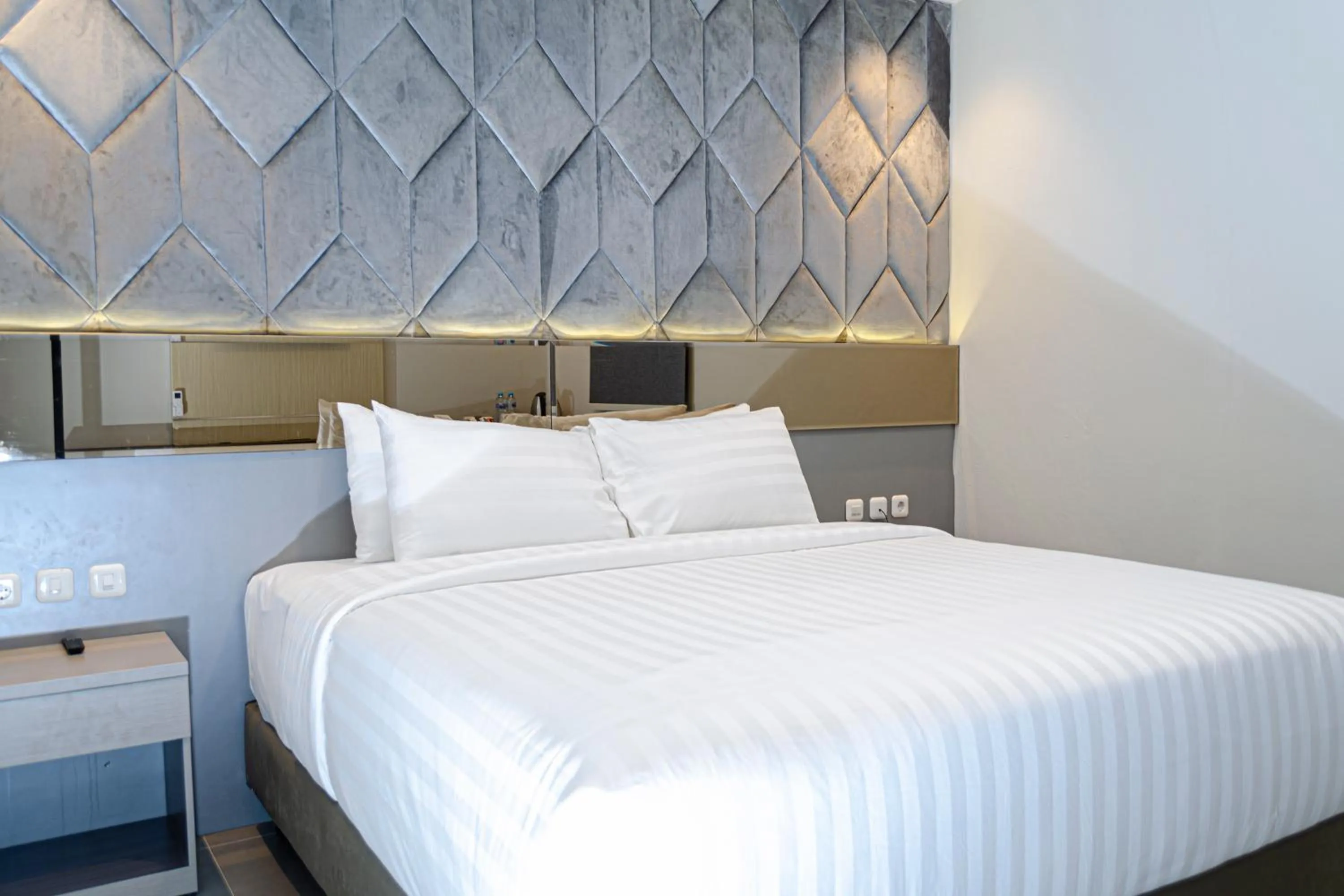 Bed in Arcadia Hotel Manado