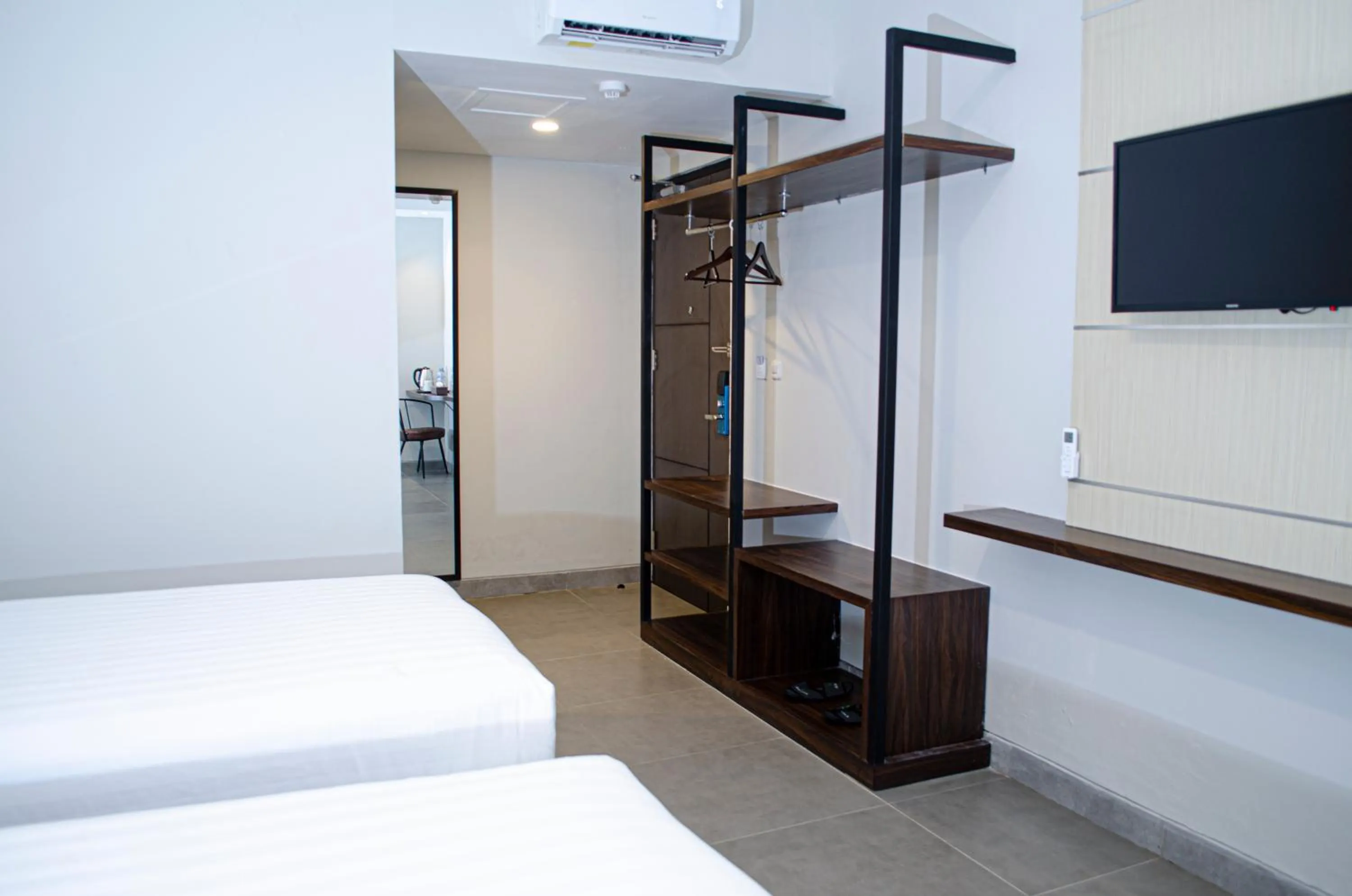 Bed in Arcadia Hotel Manado