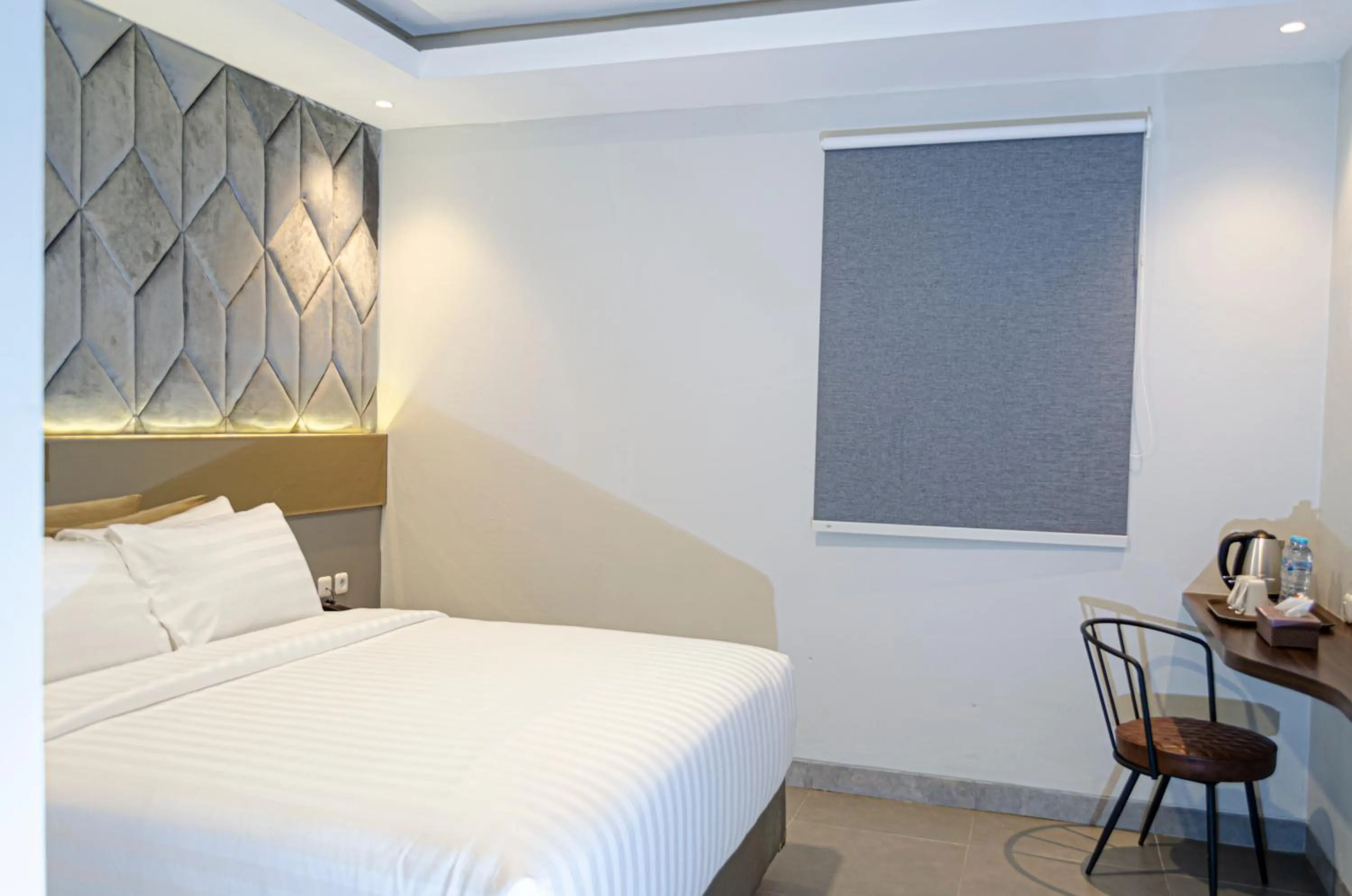 Bed in Arcadia Hotel Manado