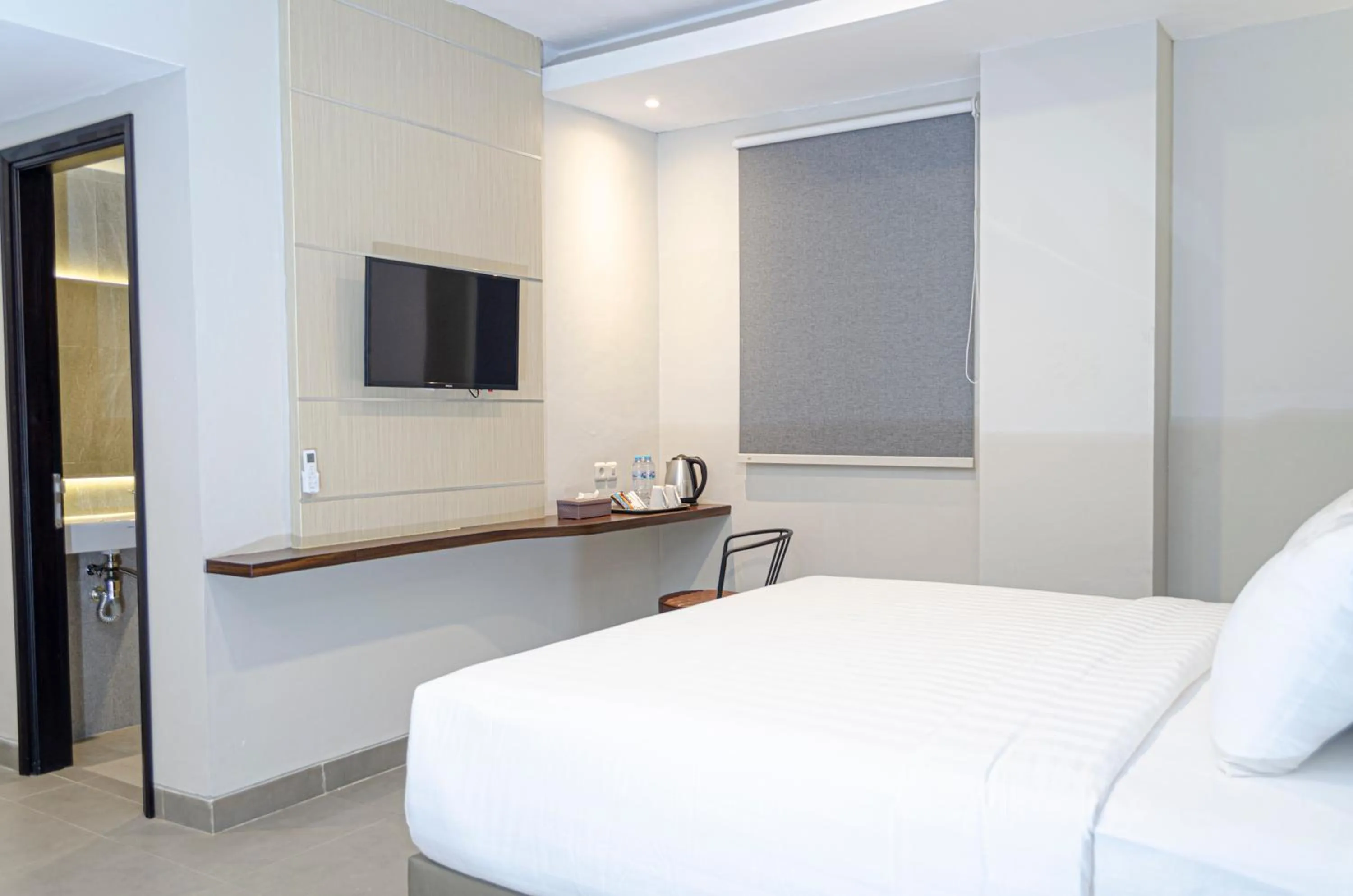 Bed in Arcadia Hotel Manado