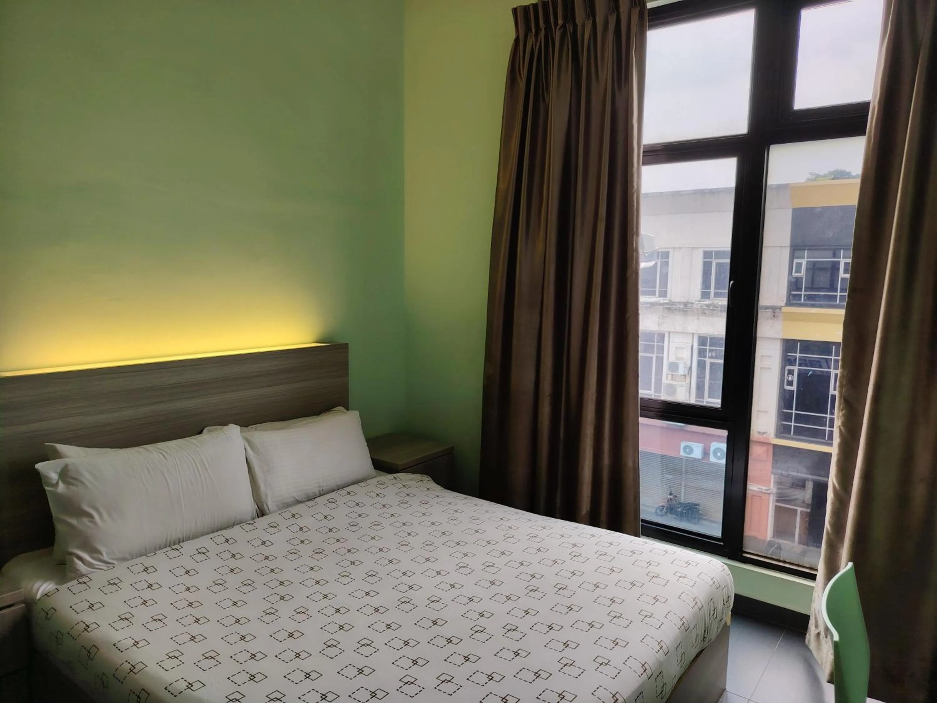 Bedroom, Bed in Kozi Hotel by Ardens - Taman Bukit Indah