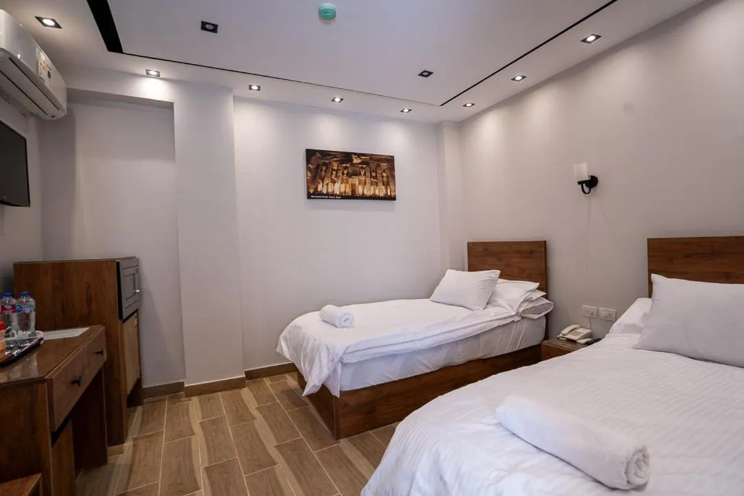 Bed in Sun and Sand Guest House