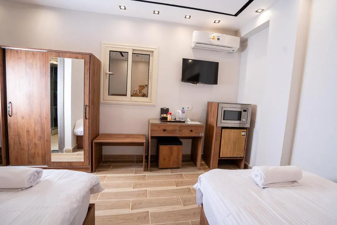 Bed in Sun and Sand Guest House