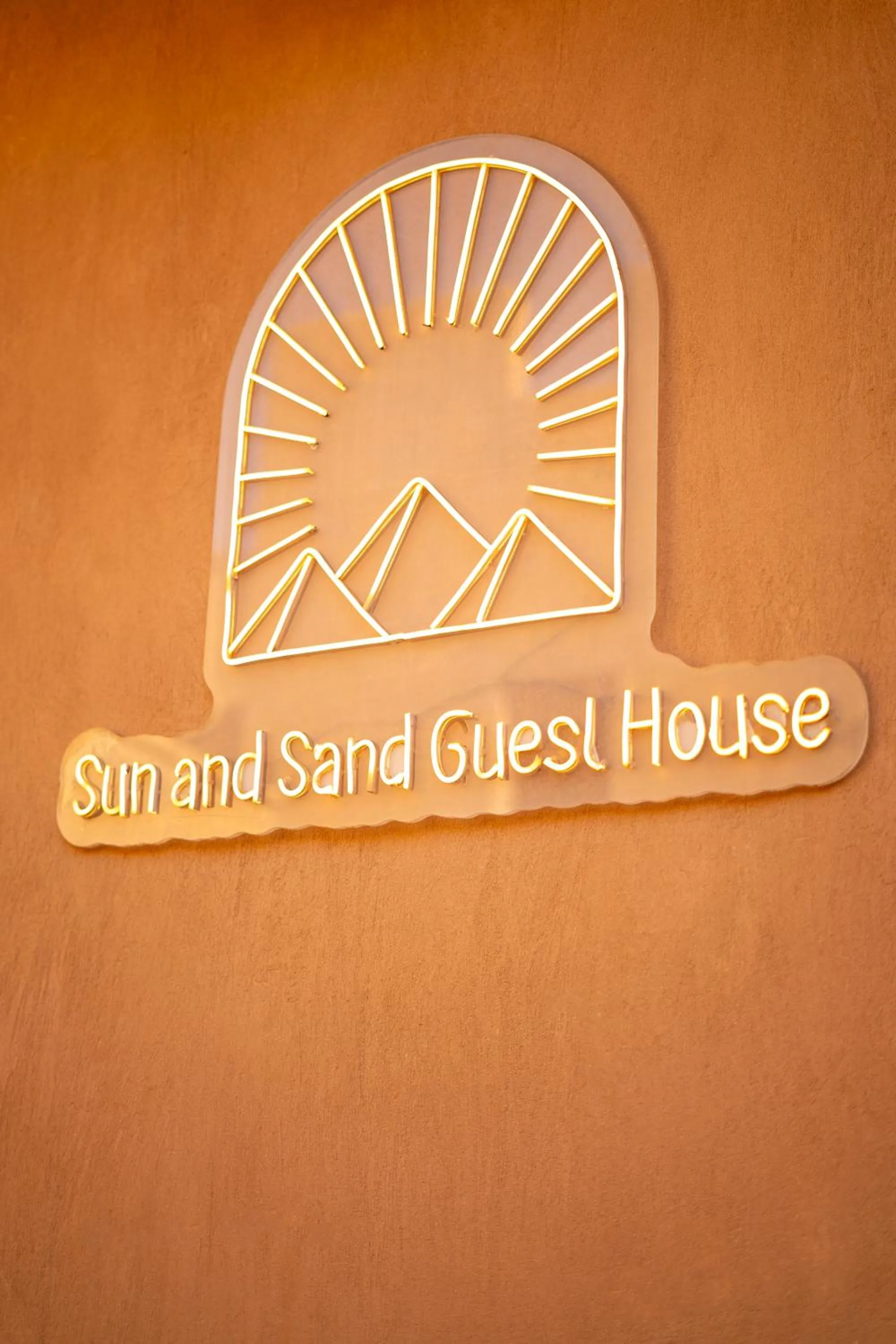 Property logo or sign in Sun and Sand Guest House