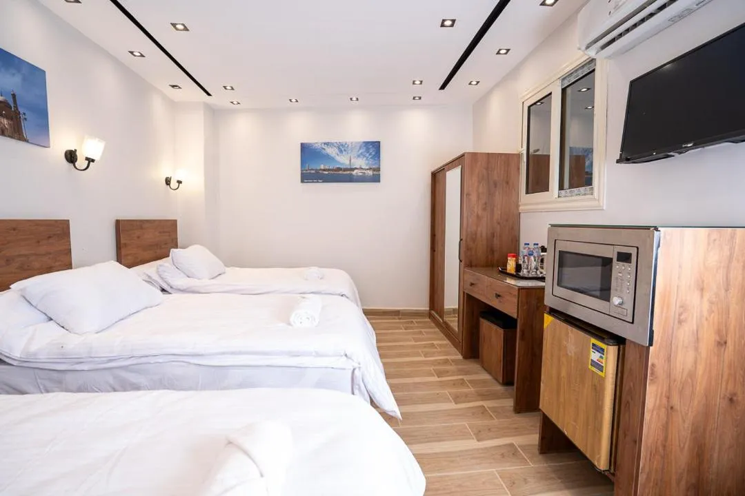 Bed in Sun and Sand Guest House