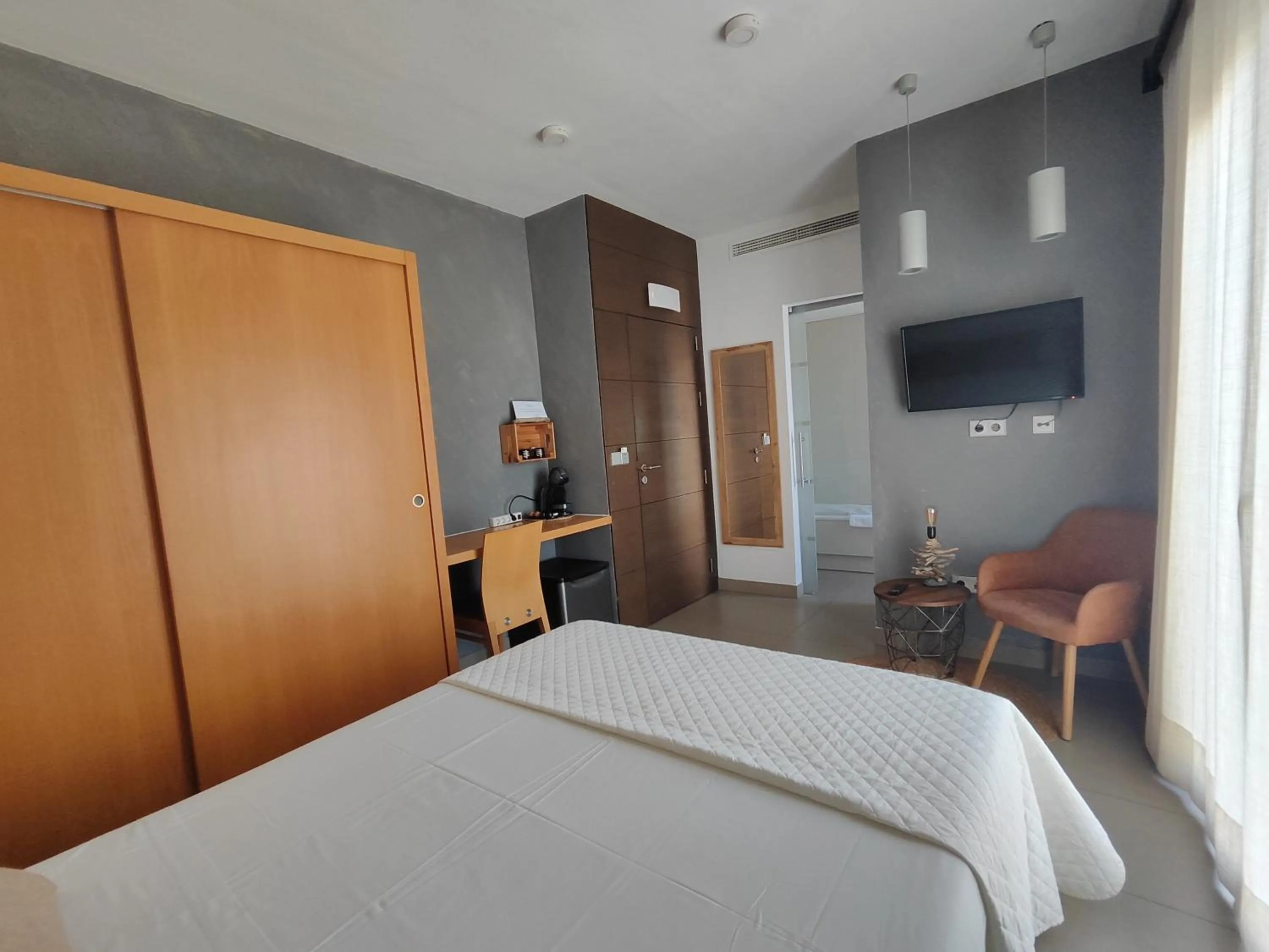 Bed in Hotel Alboran