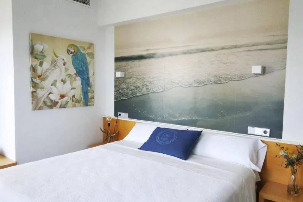 Bed in Hotel Alboran