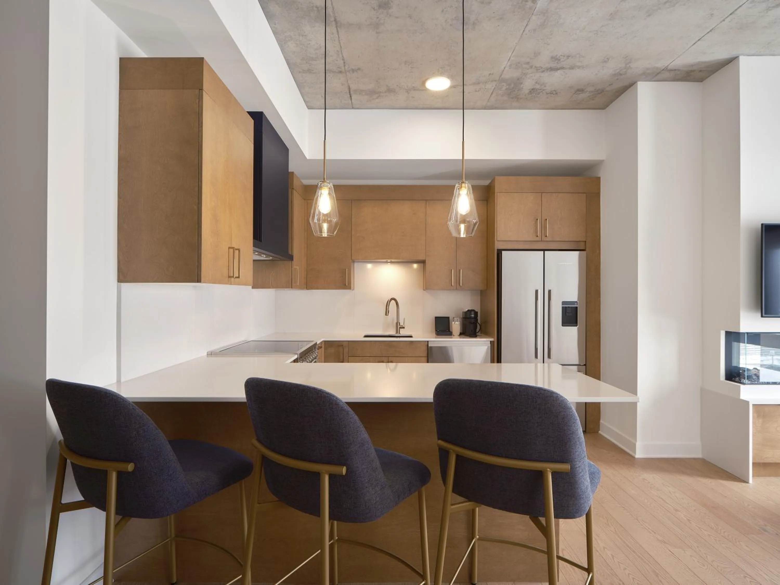 Kitchen or kitchenette in Hôtel Expérience - Quartier Des Marinas