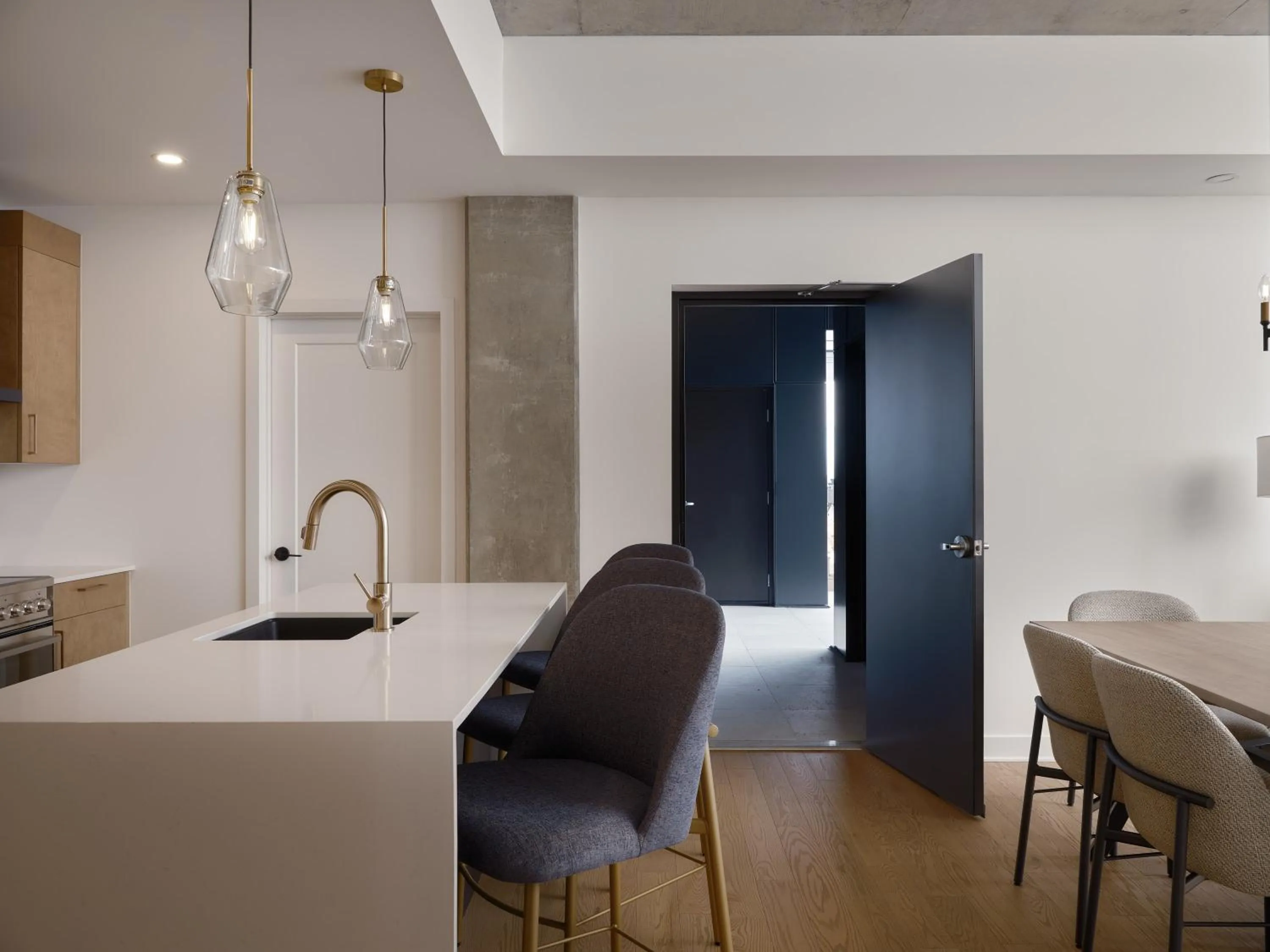 Kitchen or kitchenette in Hôtel Expérience - Quartier Des Marinas