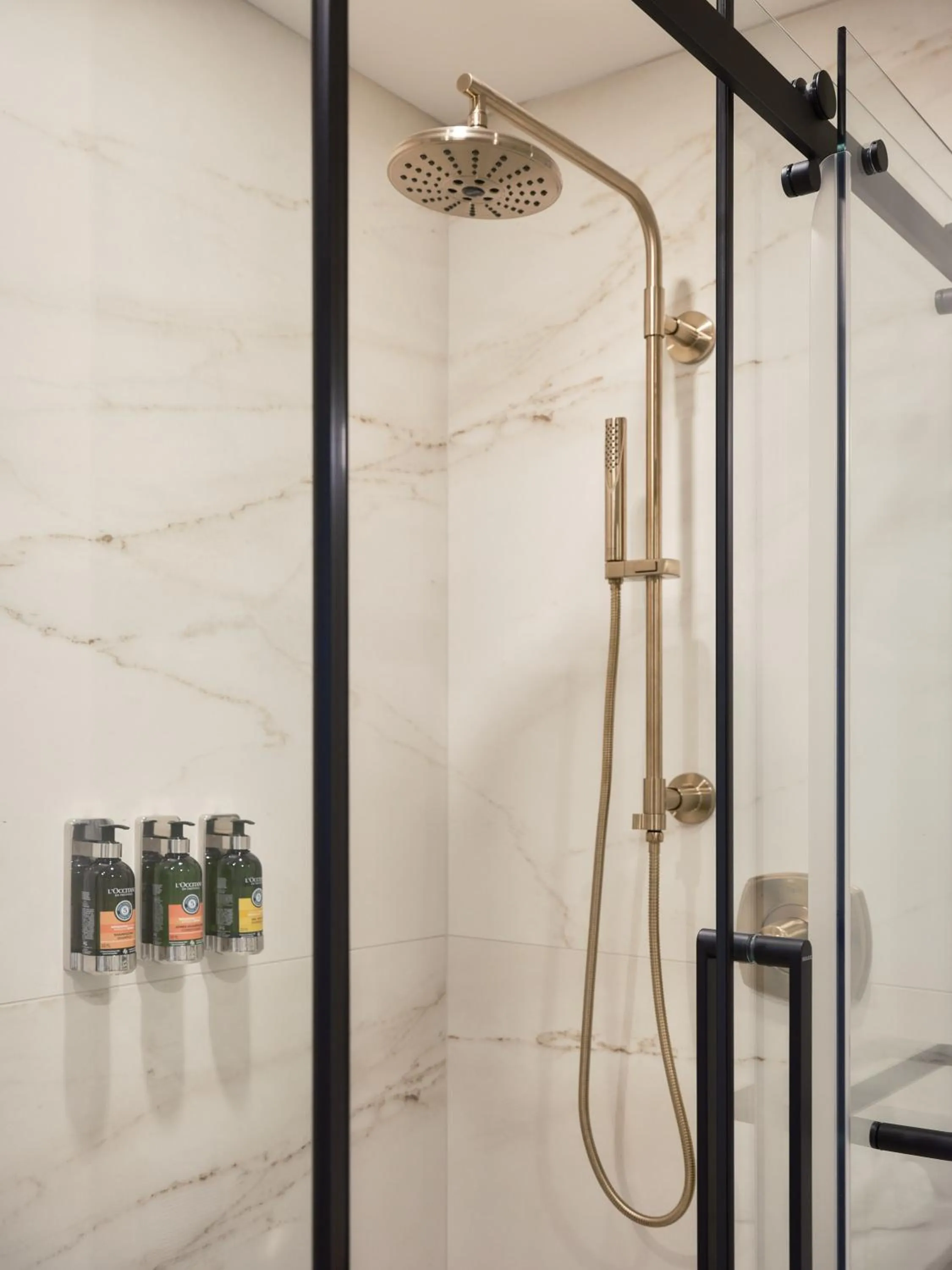 Shower in Hôtel Expérience - Quartier Des Marinas