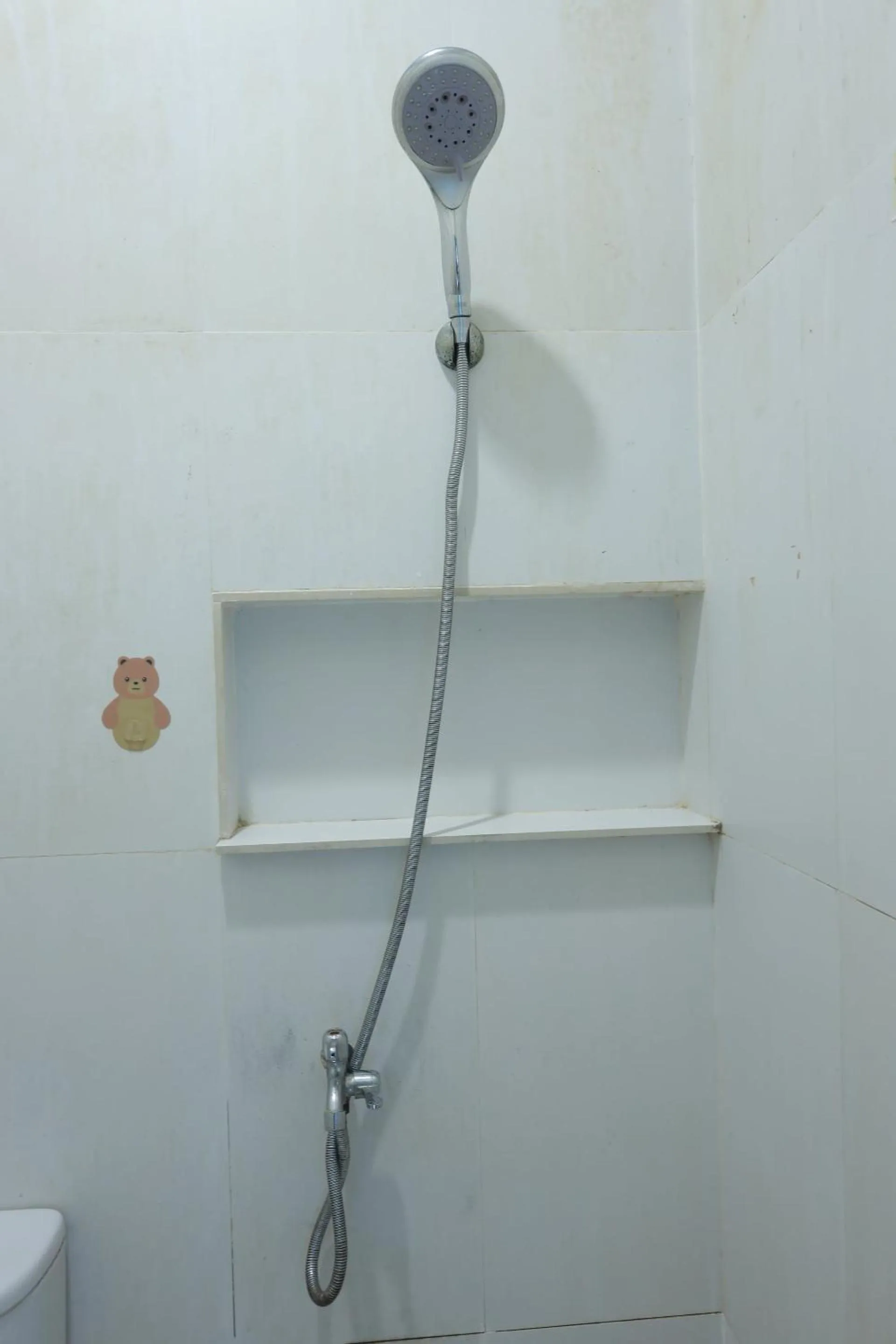 Bathroom in Hotel O Mamapapahouse