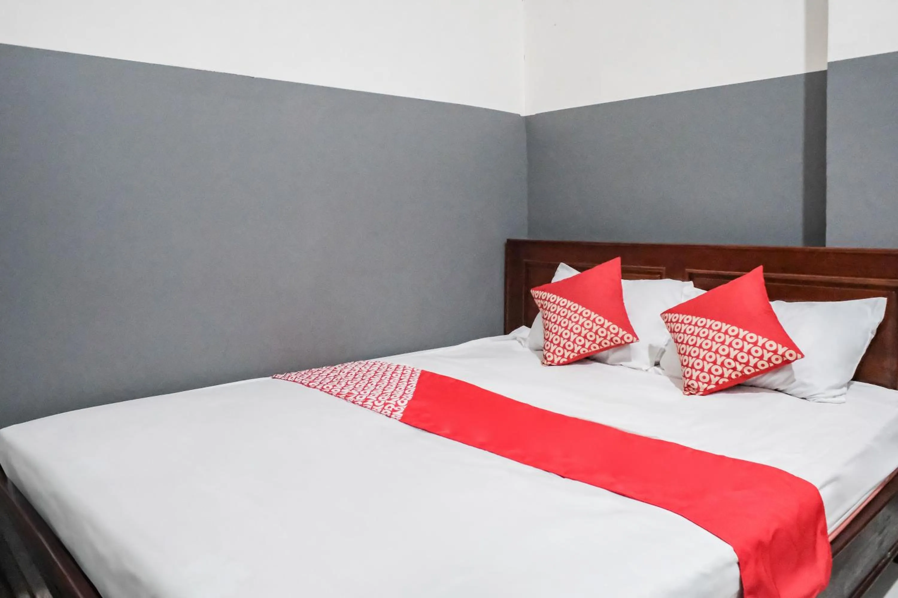 Bedroom, Bed in OYO 93117 Penginapan Tiga Dara