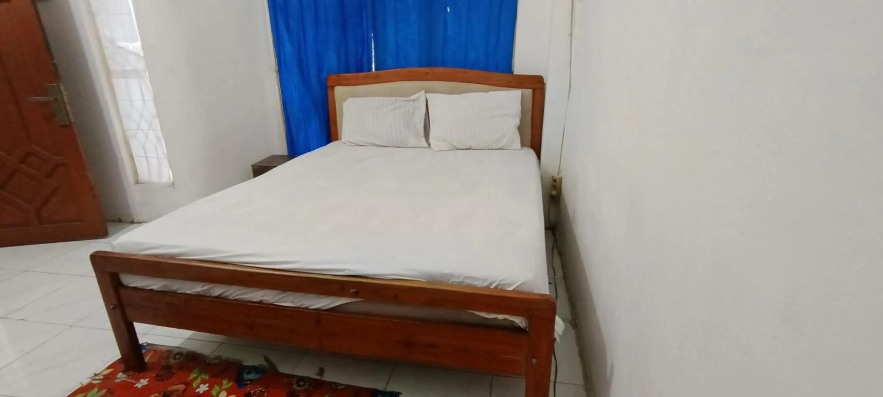 Bedroom, Bed in Hotel O Pondok Puti Sartika SyariahNearPasar Jum'at Aluh Aluh