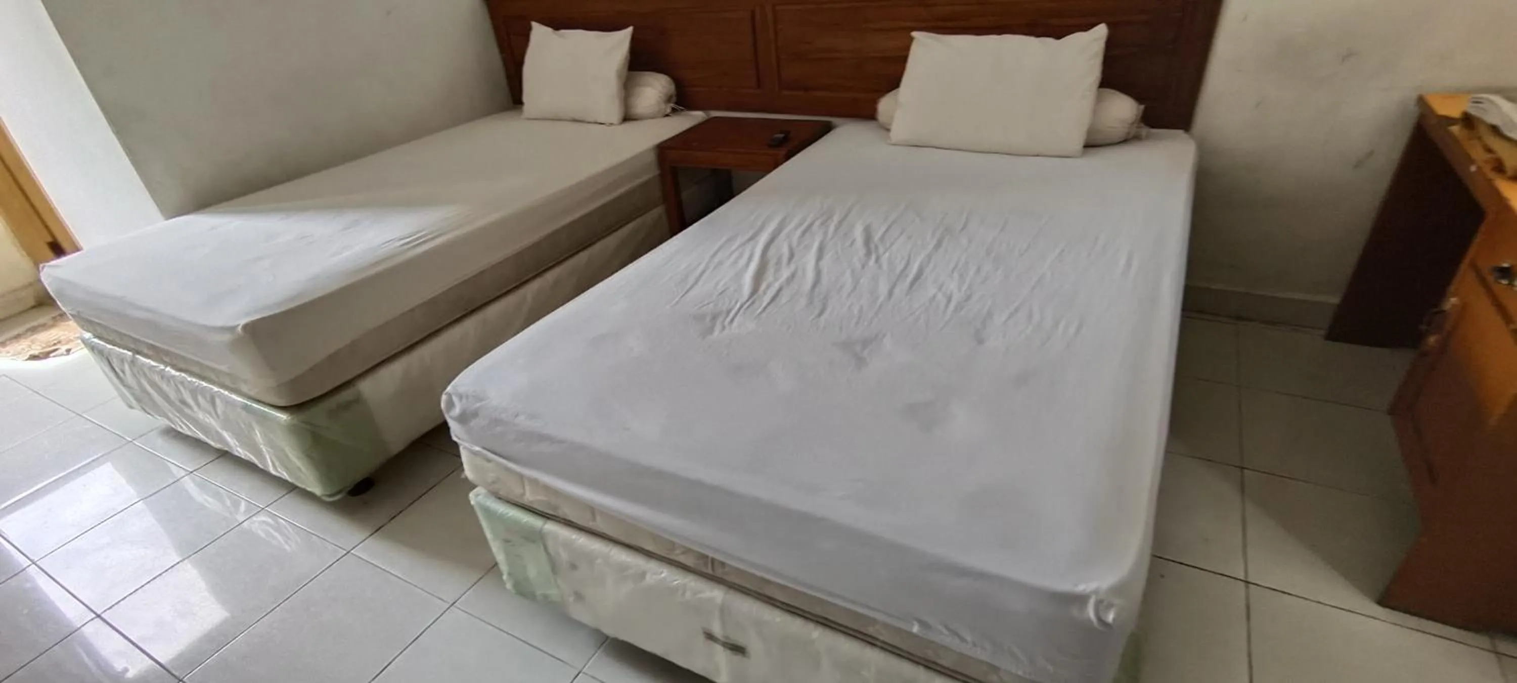 Bedroom, Bed in Hotel O Wisma Hamalau SyariahNearPulau Bromo Pedestrian Bridge