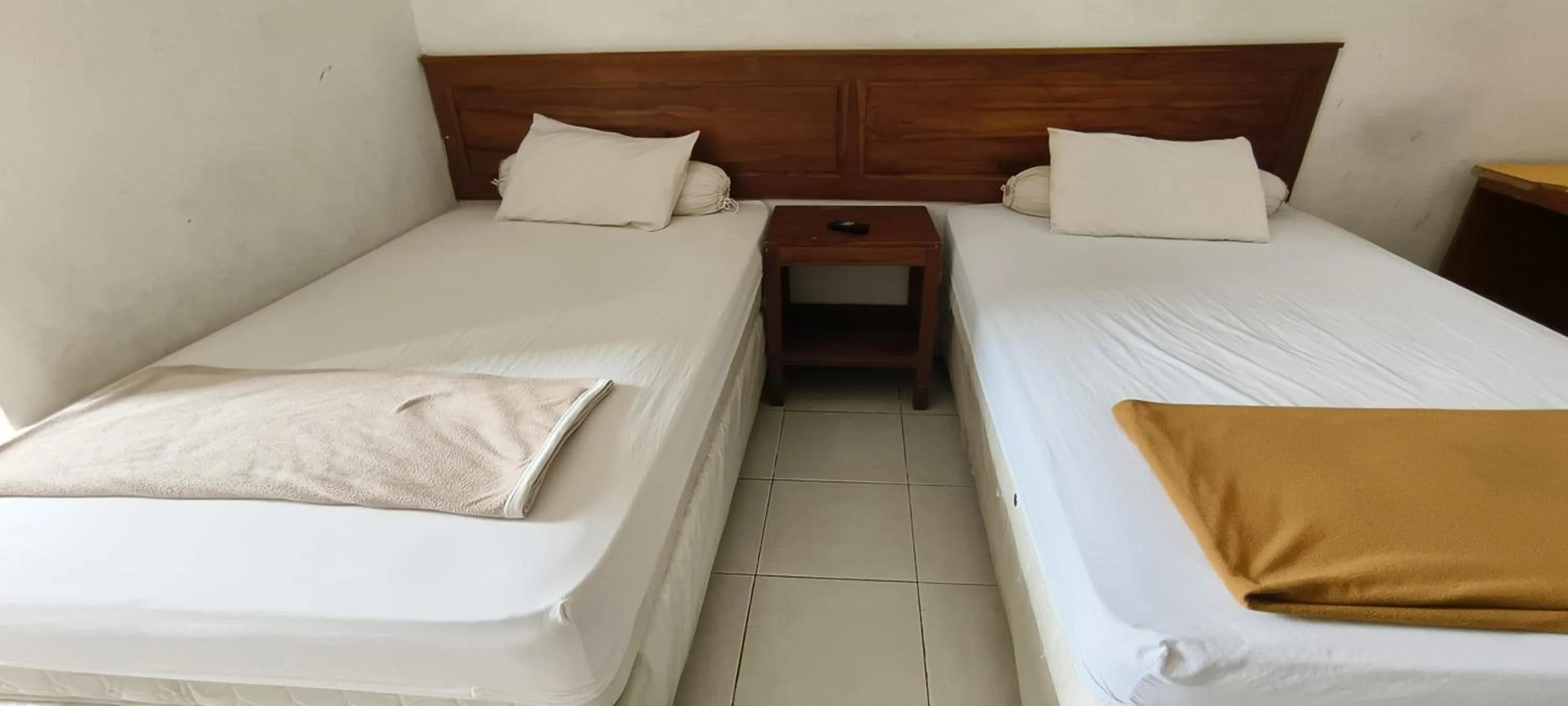 Bedroom, Bed in Hotel O Wisma Hamalau SyariahNearPulau Bromo Pedestrian Bridge