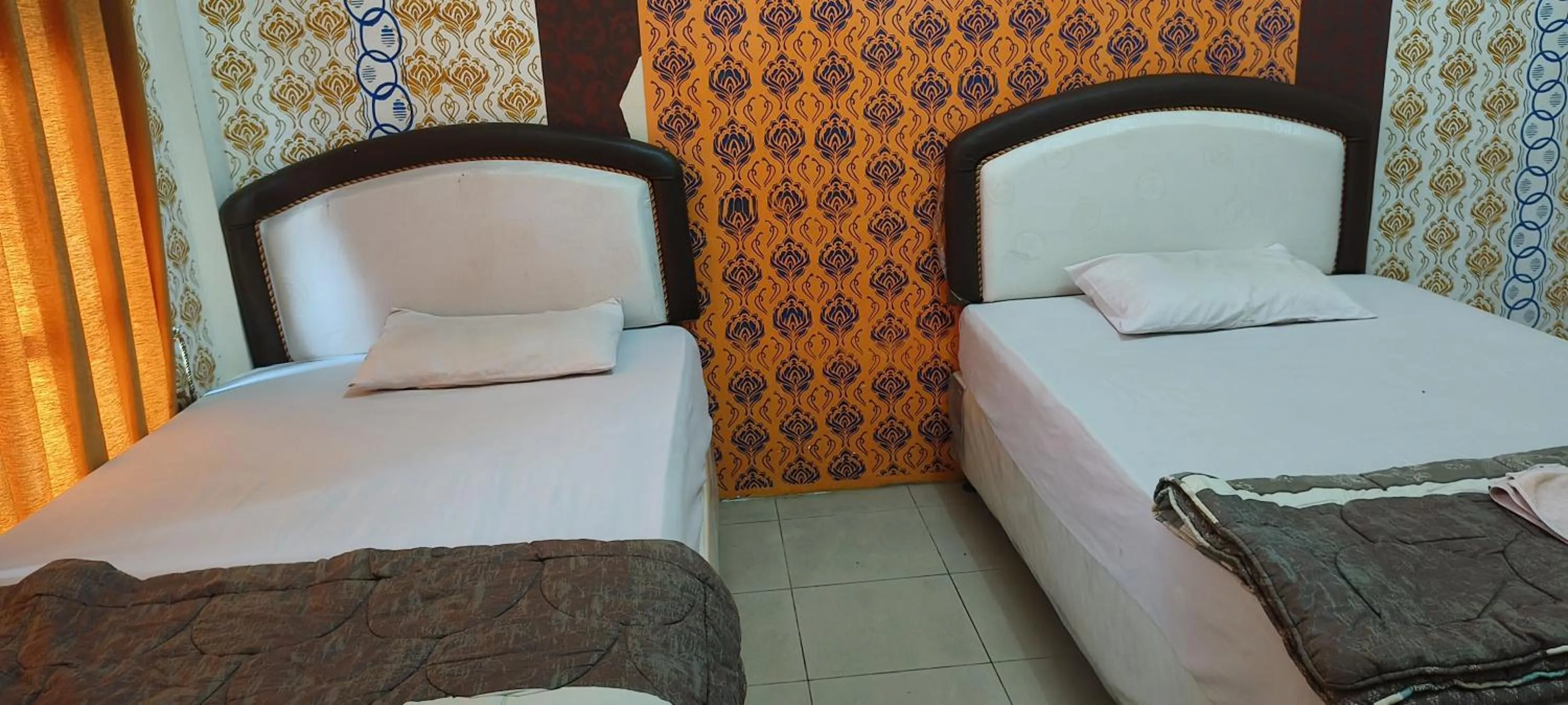 Bedroom, Bed in Hotel O Wisma Hamalau SyariahNearPulau Bromo Pedestrian Bridge