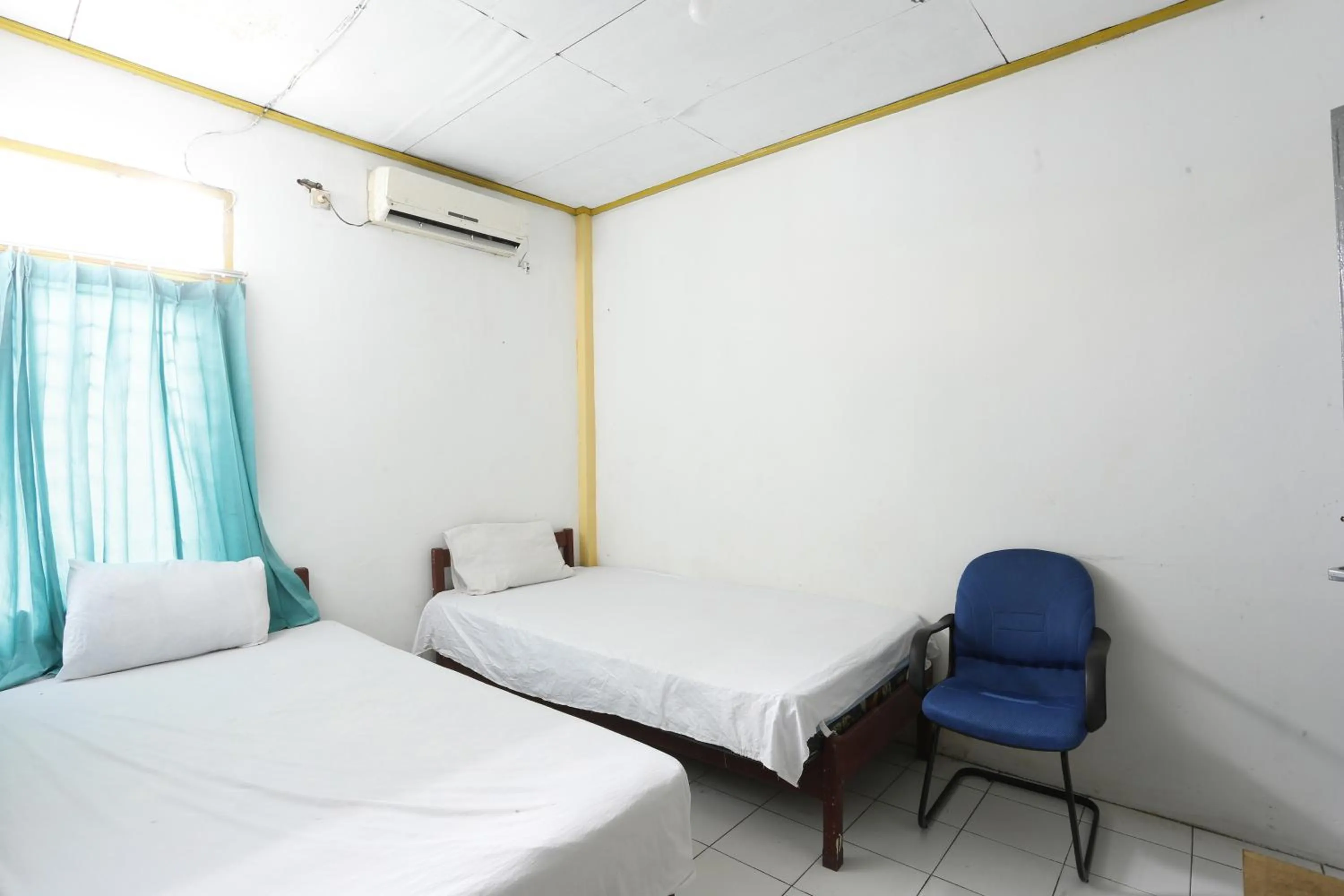 Bedroom, Bed in Hotel O Penginapan Budhe Sri