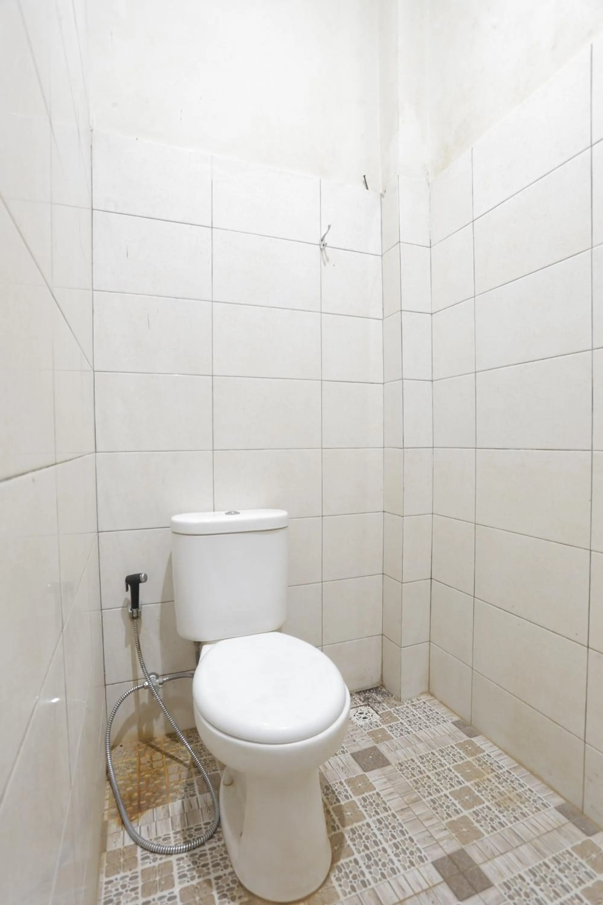 Bathroom in Hotel O Penginapan Budhe Sri