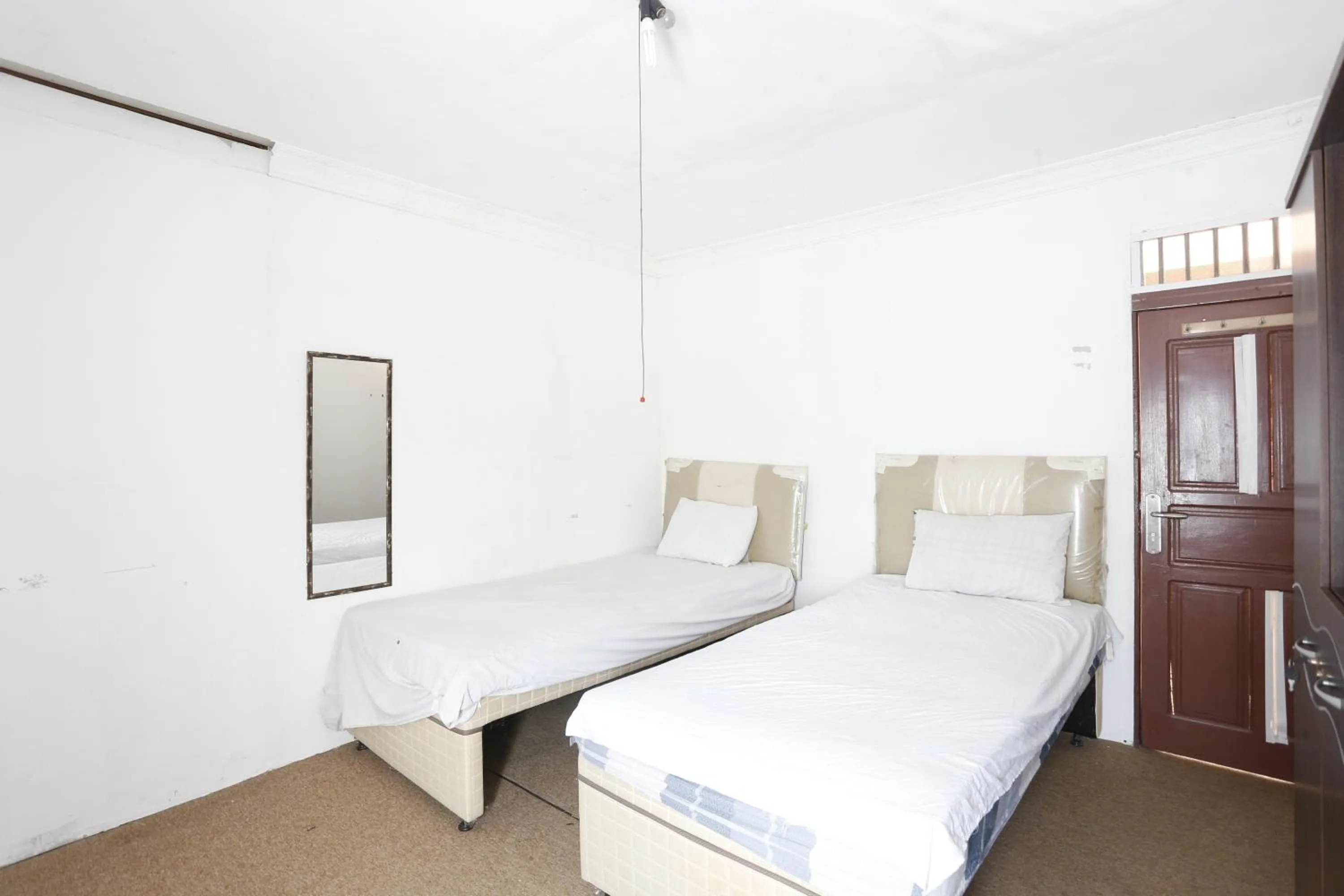 Bedroom, Bed in Hotel O Penginapan Budhe Sri