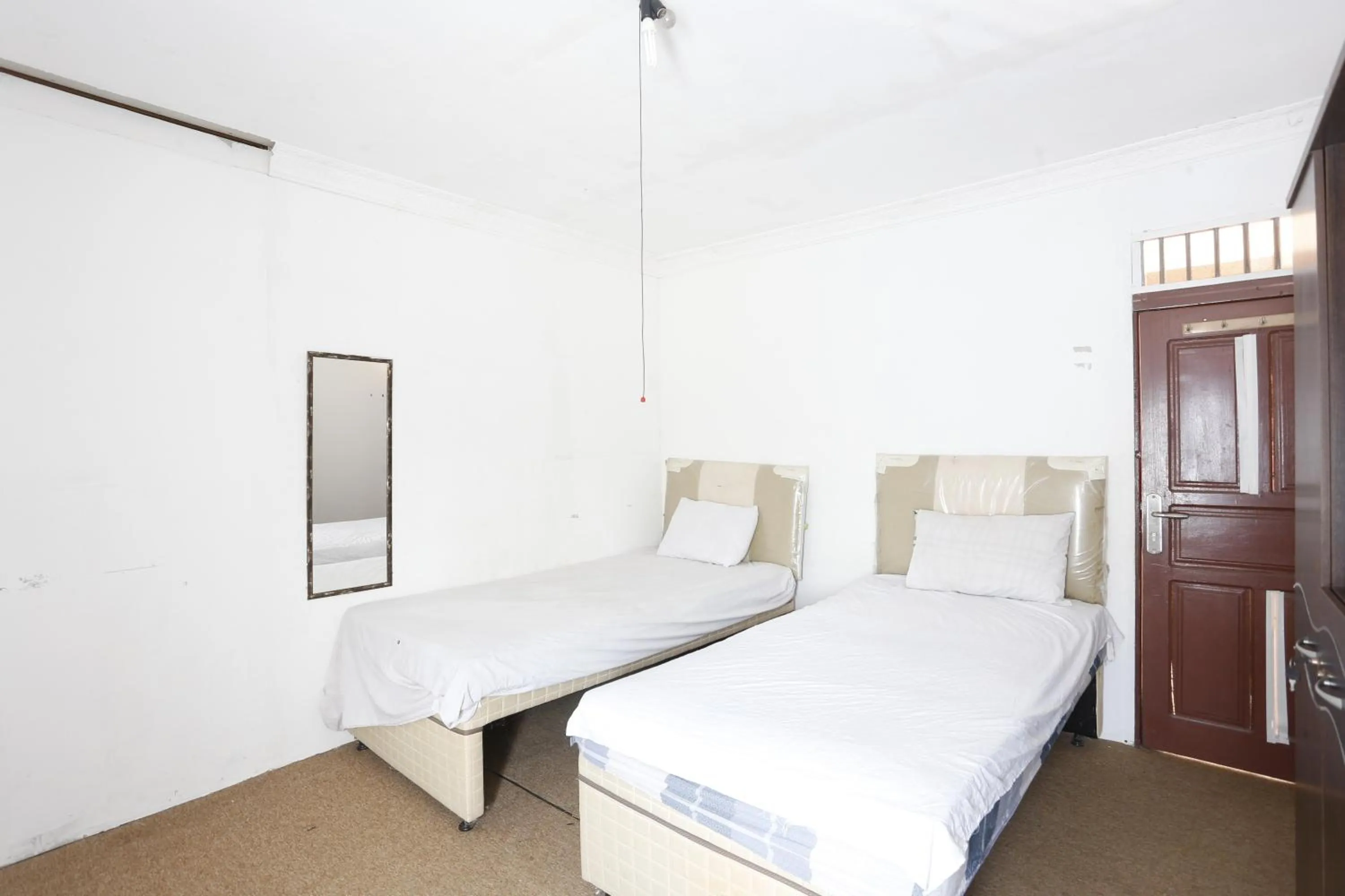 Bedroom, Bed in Hotel O Penginapan Budhe Sri