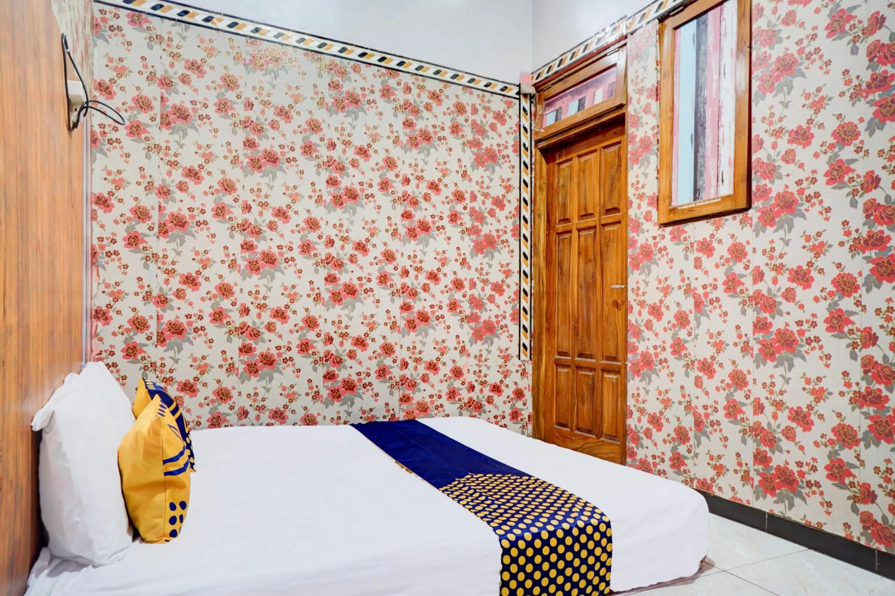 Bedroom in Hotel O Karman's Sari 1 Homestay Syariah