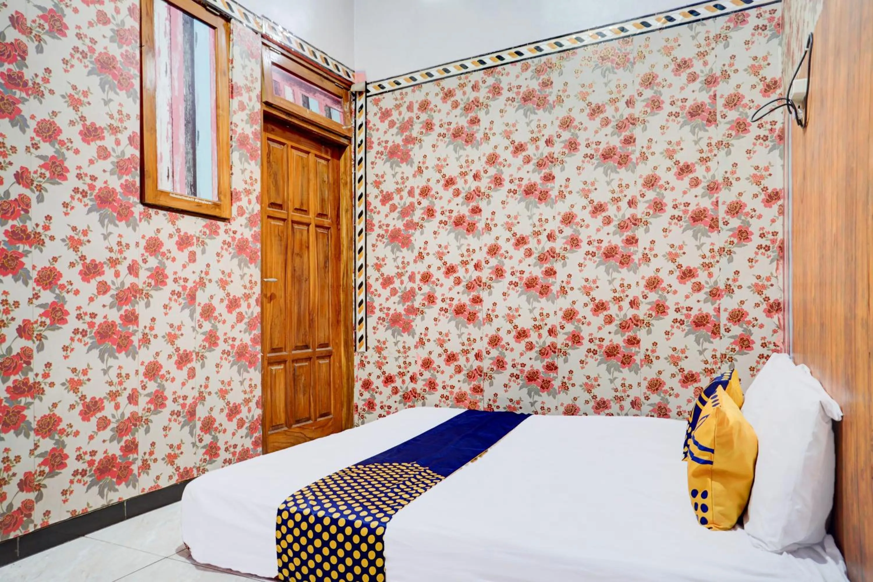 Bedroom in Hotel O Karman's Sari 1 Homestay Syariah