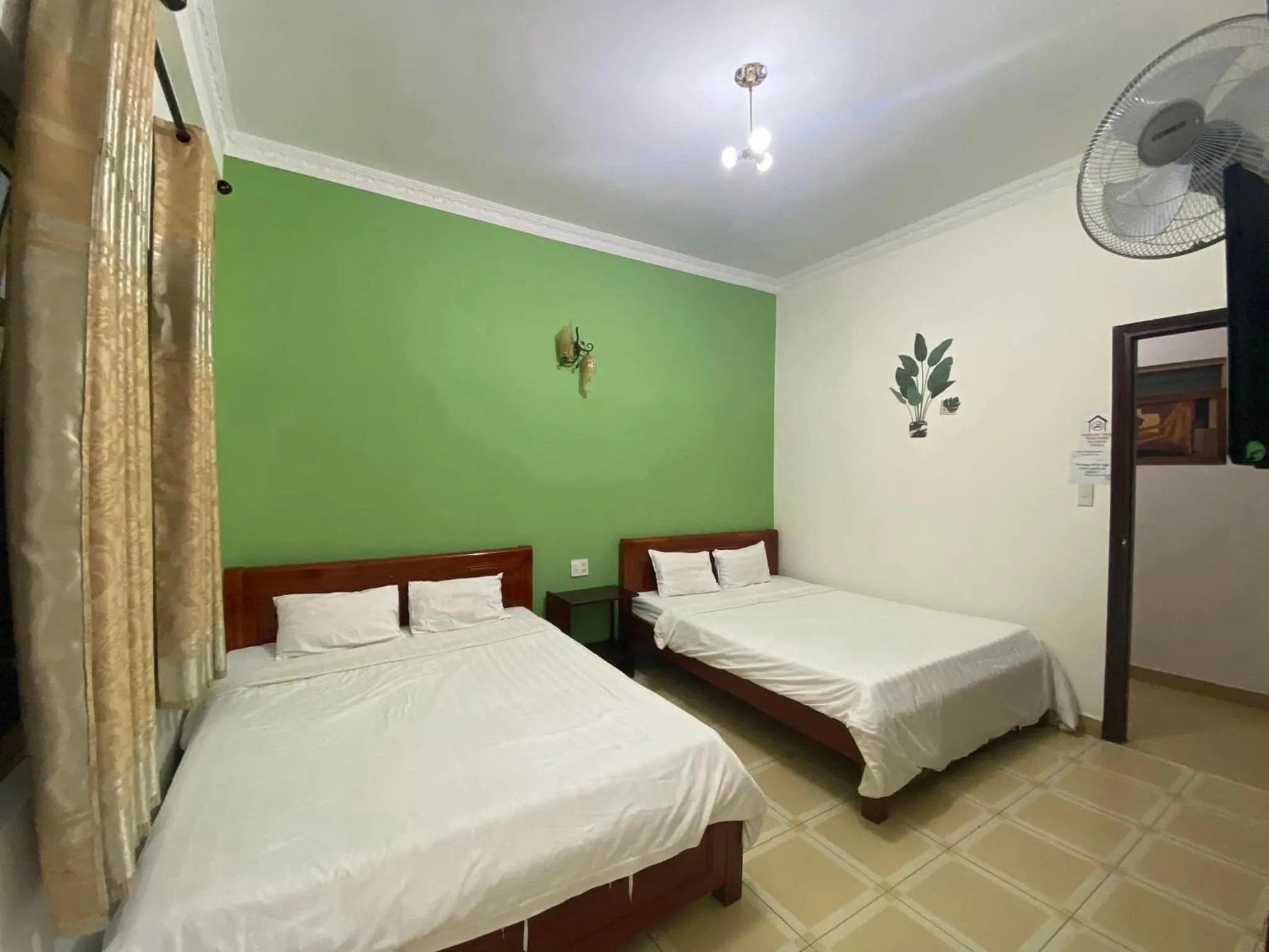 Bed in Mr.Happy Homestay