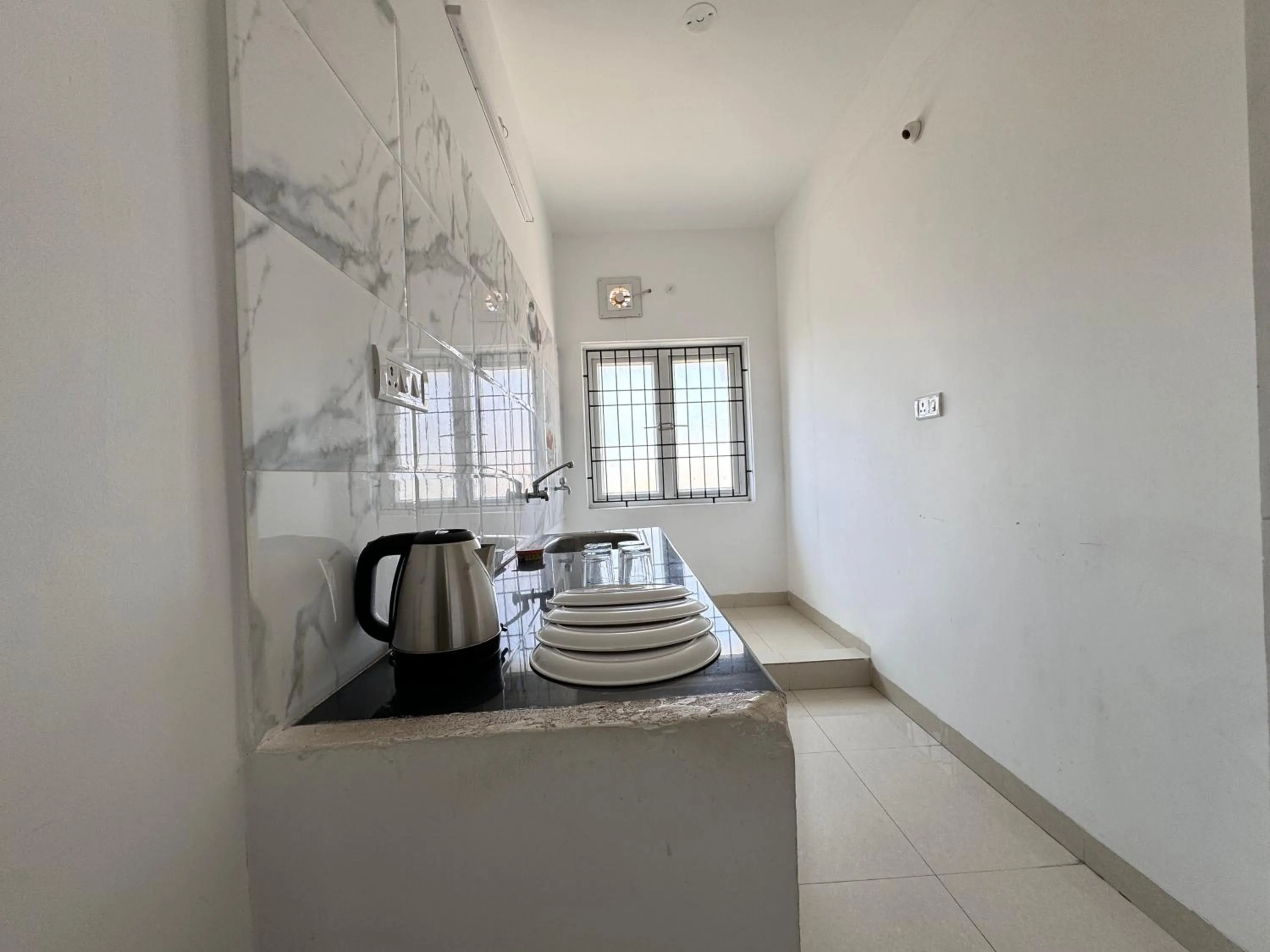 kitchen in Royal Beach Service Apartment