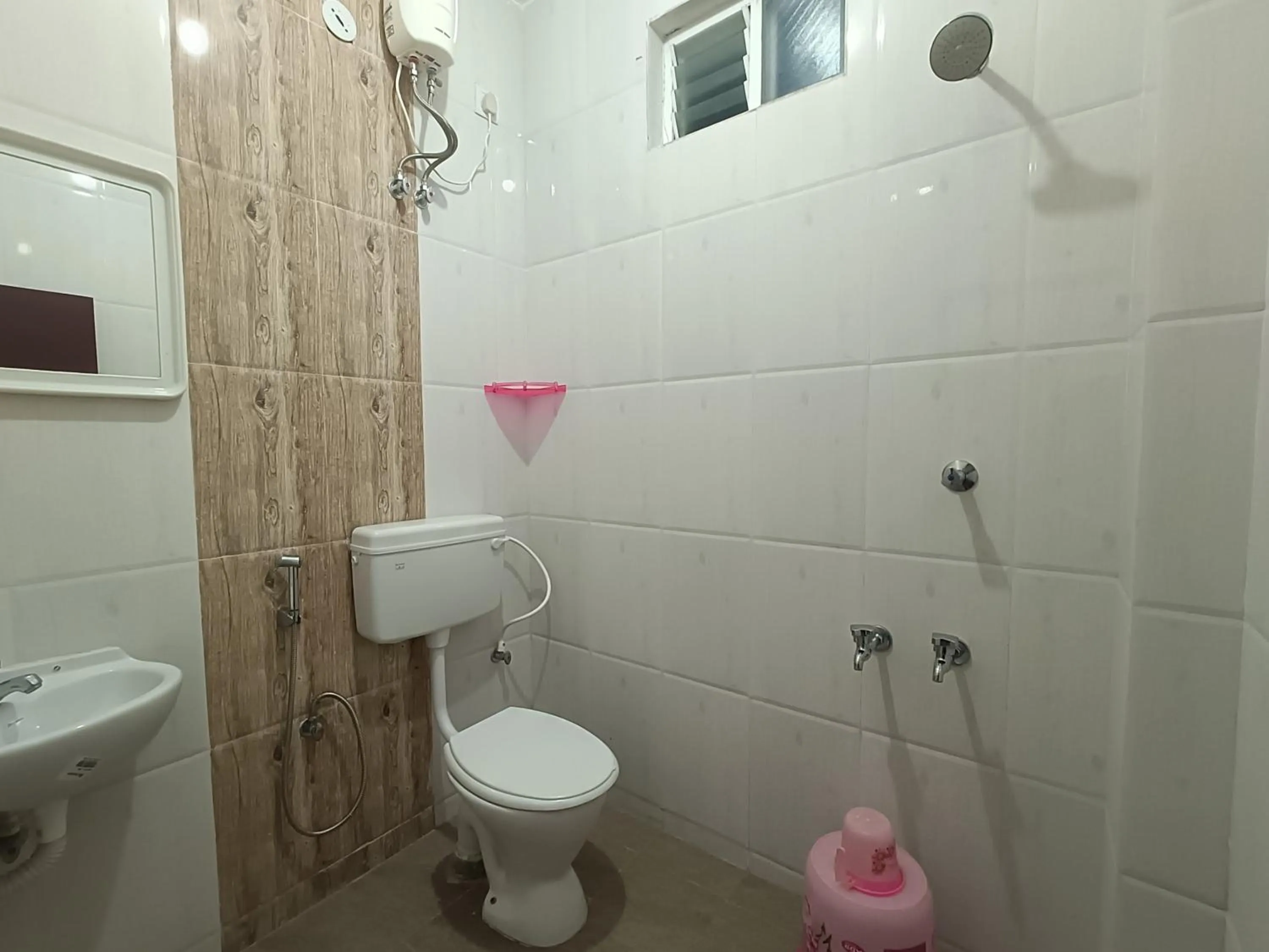 Shower in Royal Beach Service Apartment