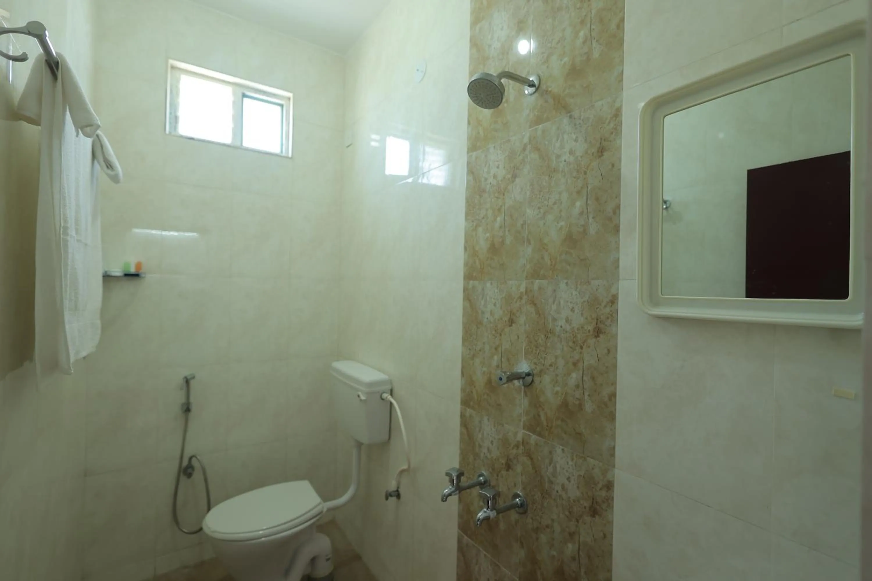 Shower in Royal Beach Service Apartment