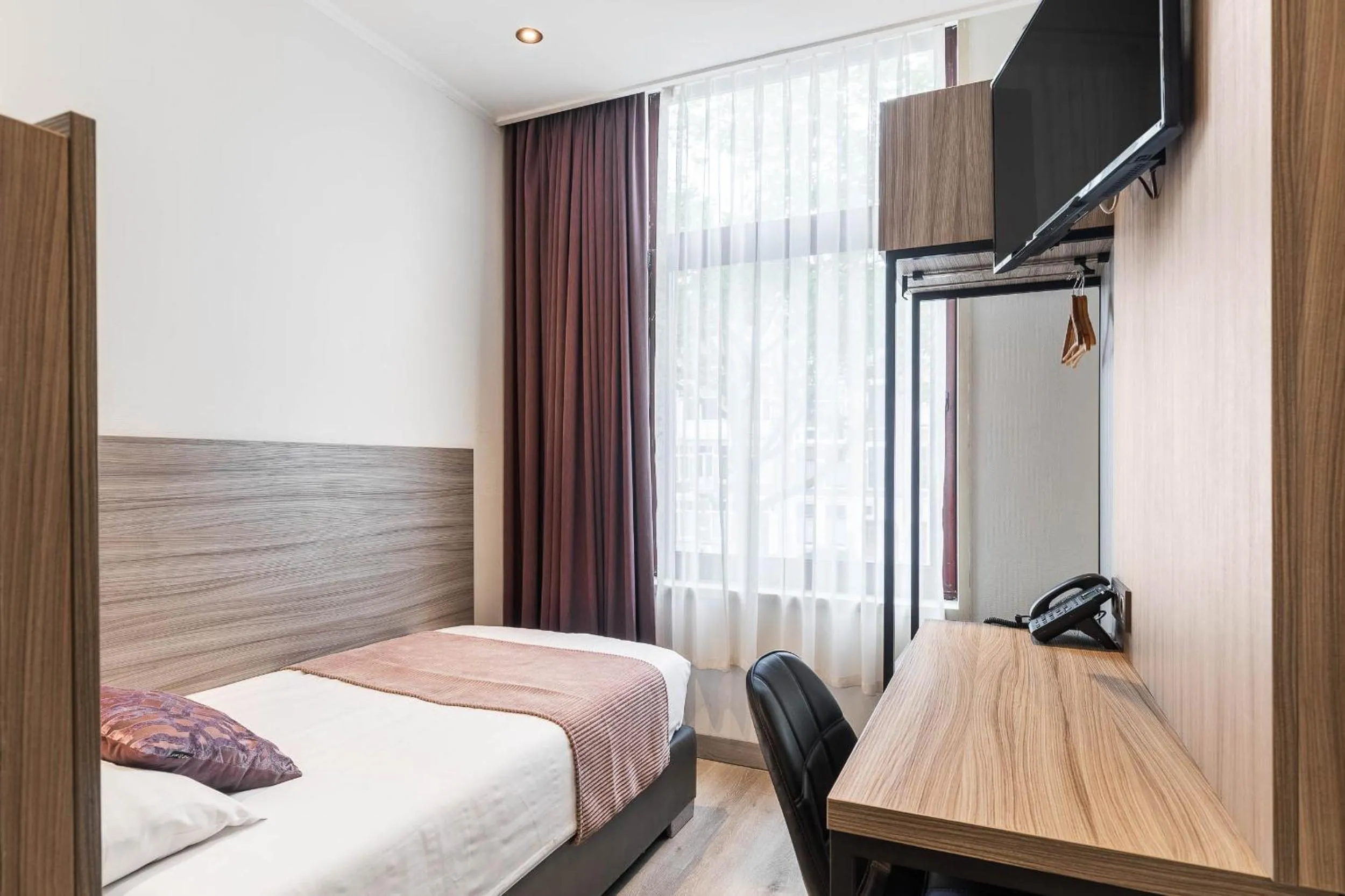 Bed in Boutique Hotel Milano Rotterdam-Centre