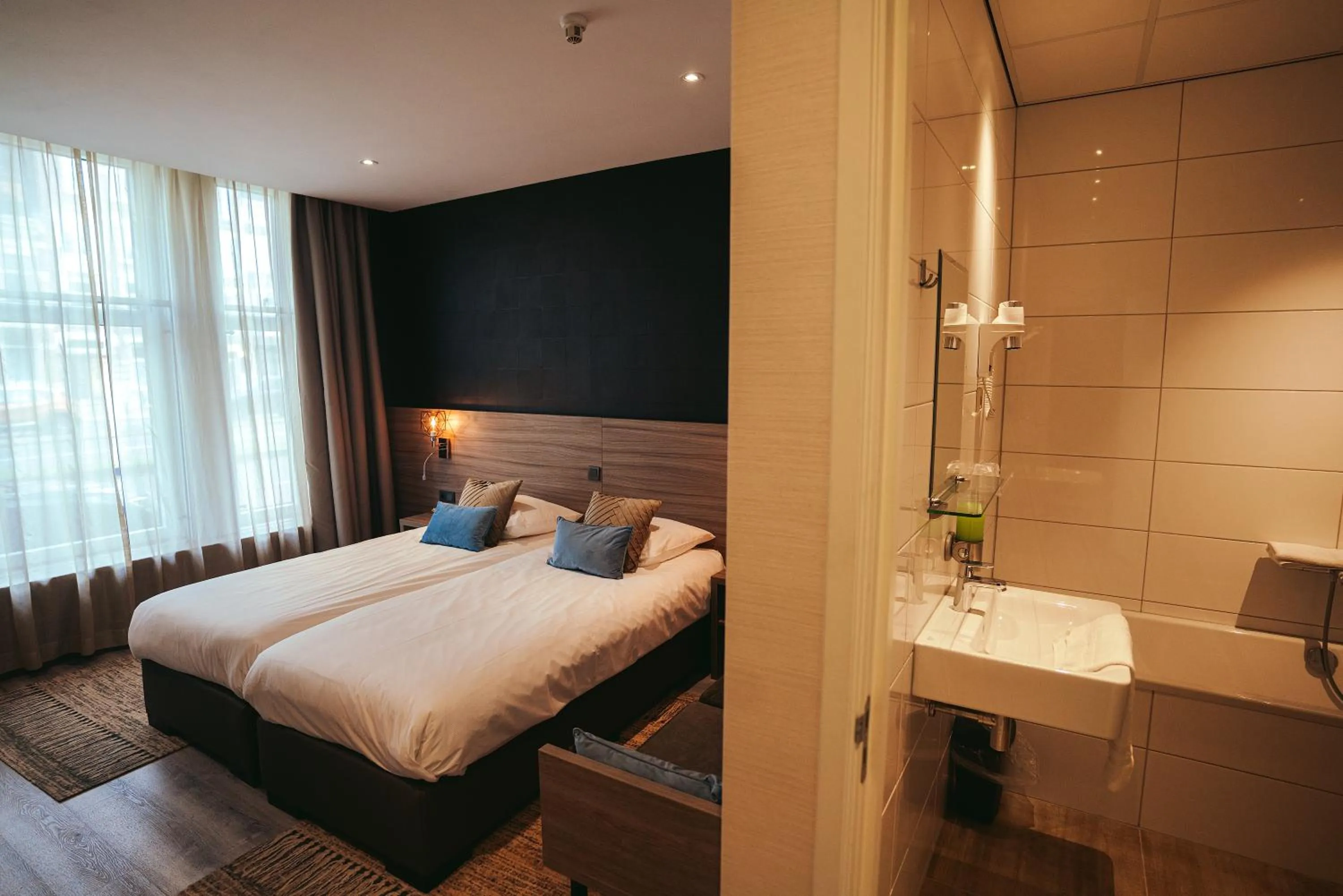 Bed in Boutique Hotel Milano Rotterdam-Centre