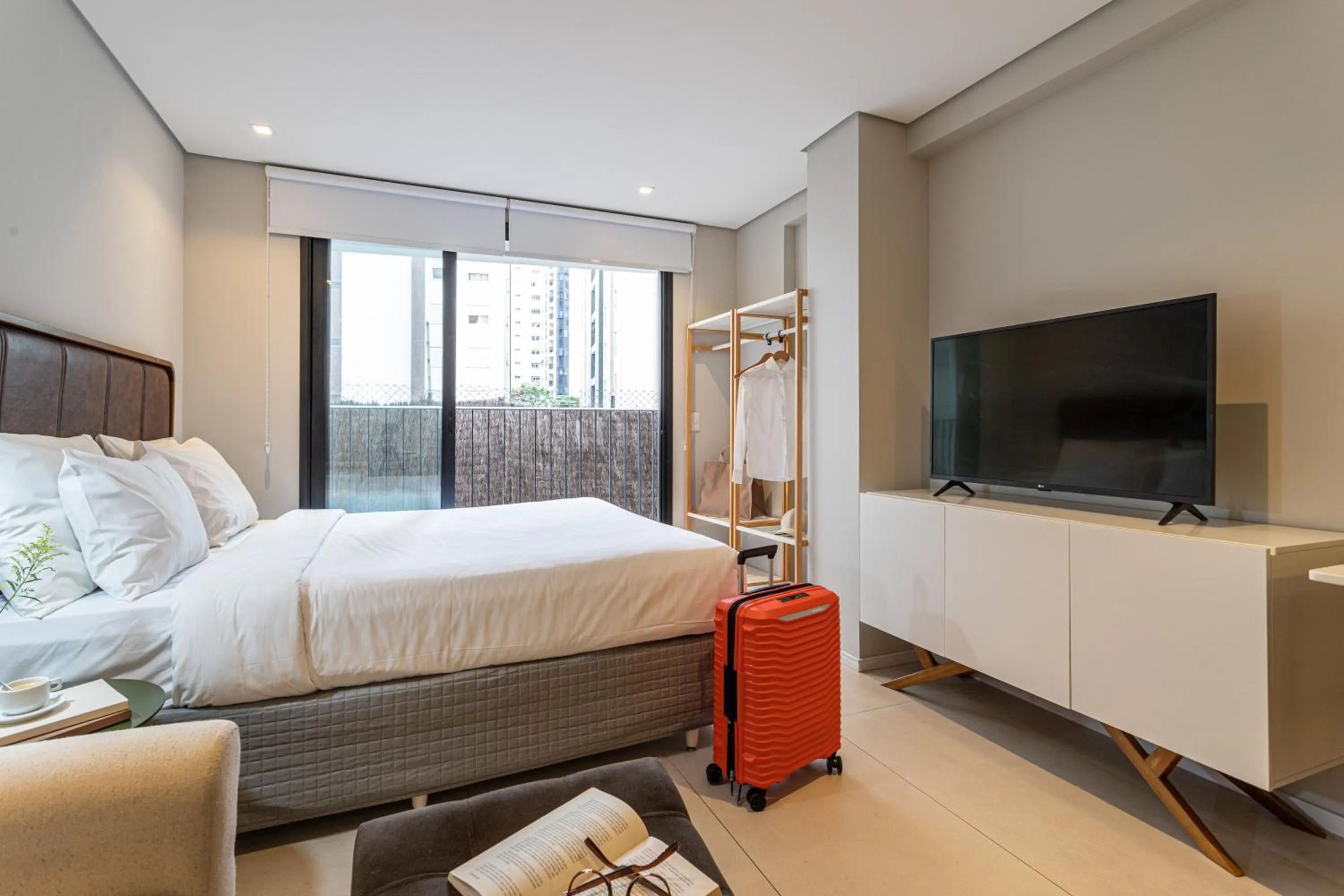 Bed in Next Home Design by Viva - Apartamentos em prédio próximo ao Parque do Ibirapuera