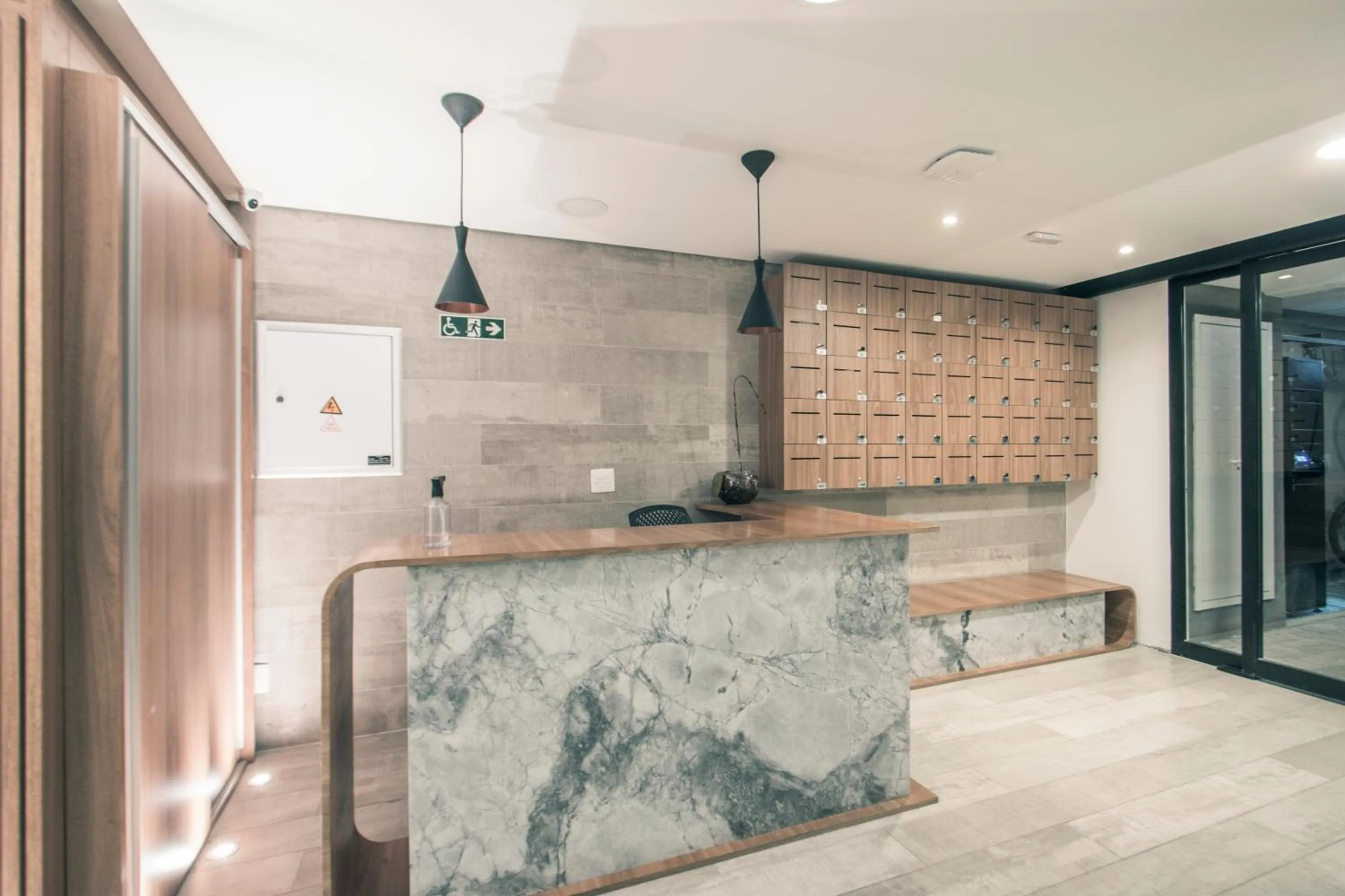 Lobby or reception in Next Home Design by Viva - Apartamentos em prédio próximo ao Parque do Ibirapuera