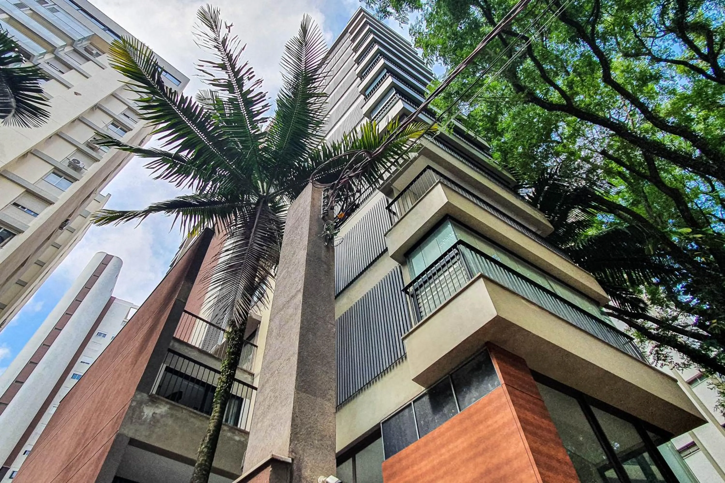 Property building in Next Home Design by Viva - Apartamentos em prédio próximo ao Parque do Ibirapuera