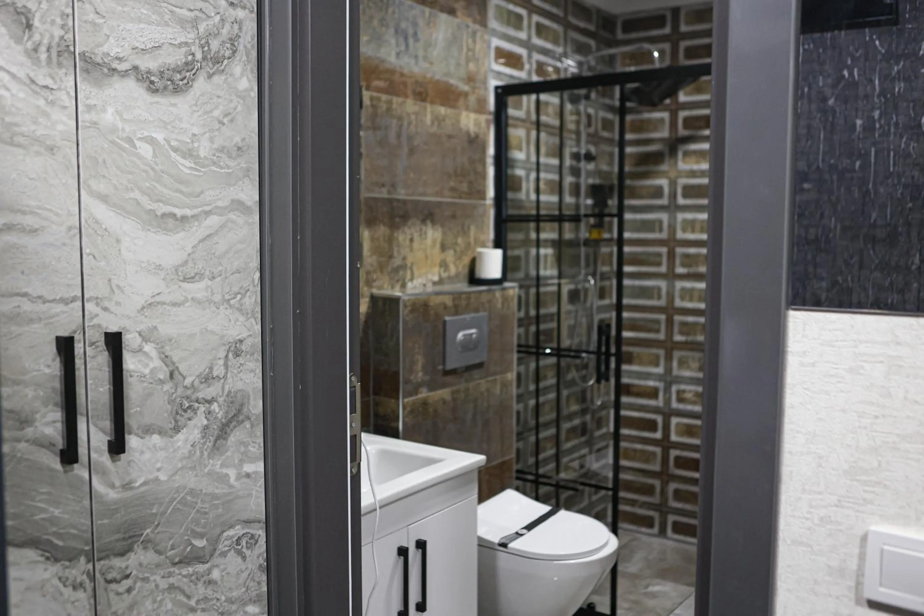 Bathroom in City Night Suites & Hotels