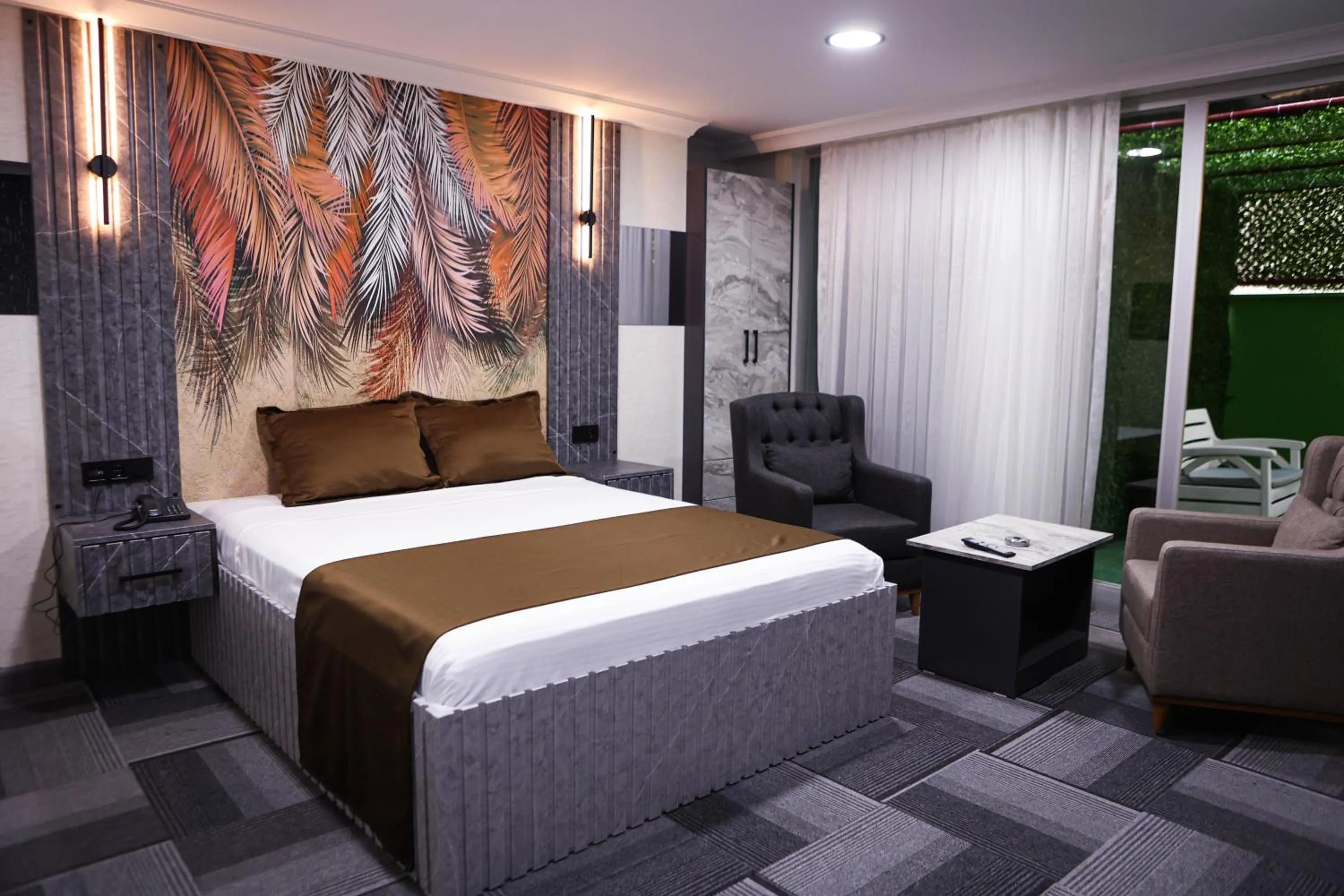 Bedroom in City Night Suites & Hotels