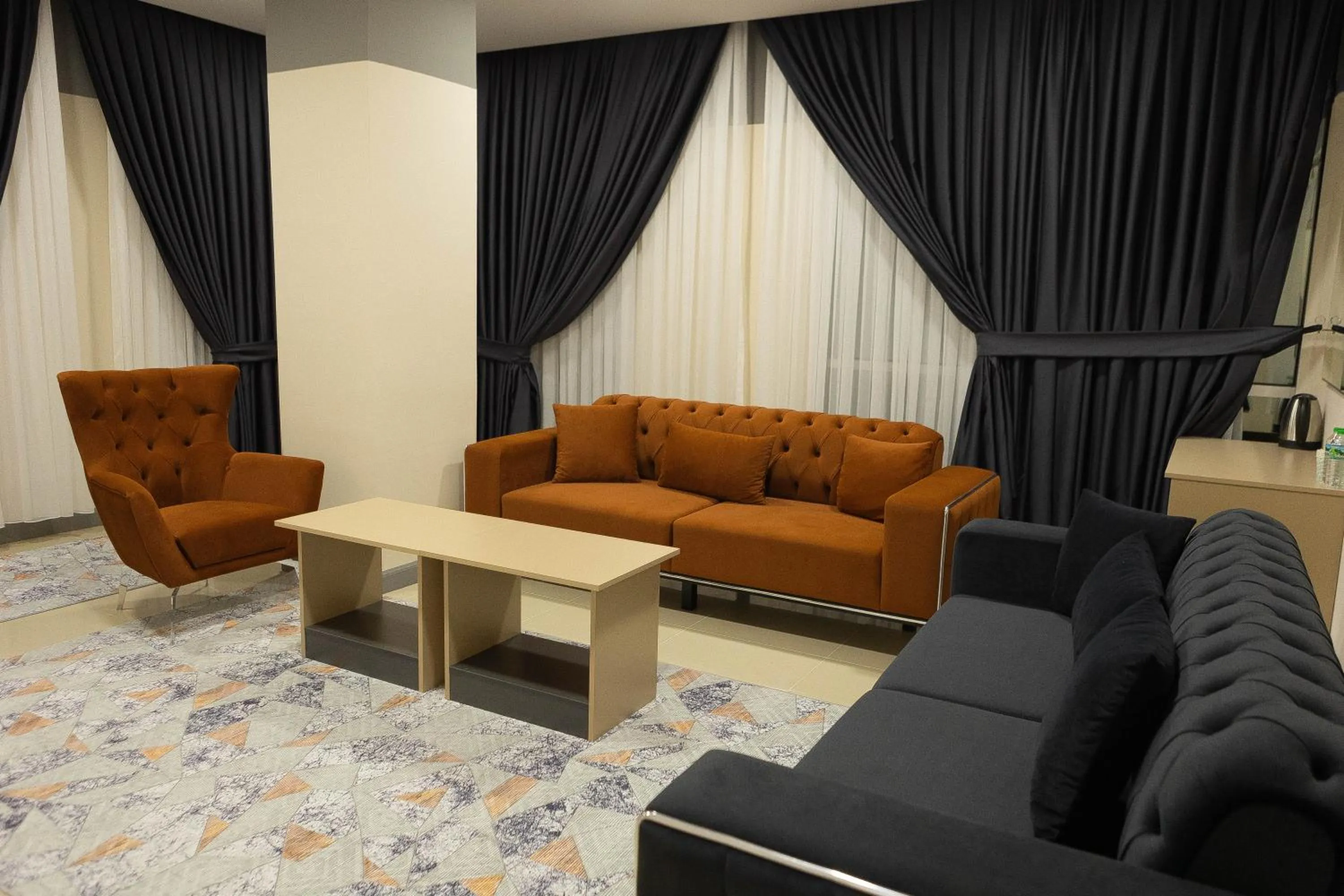 Living room in City Night Suites & Hotels