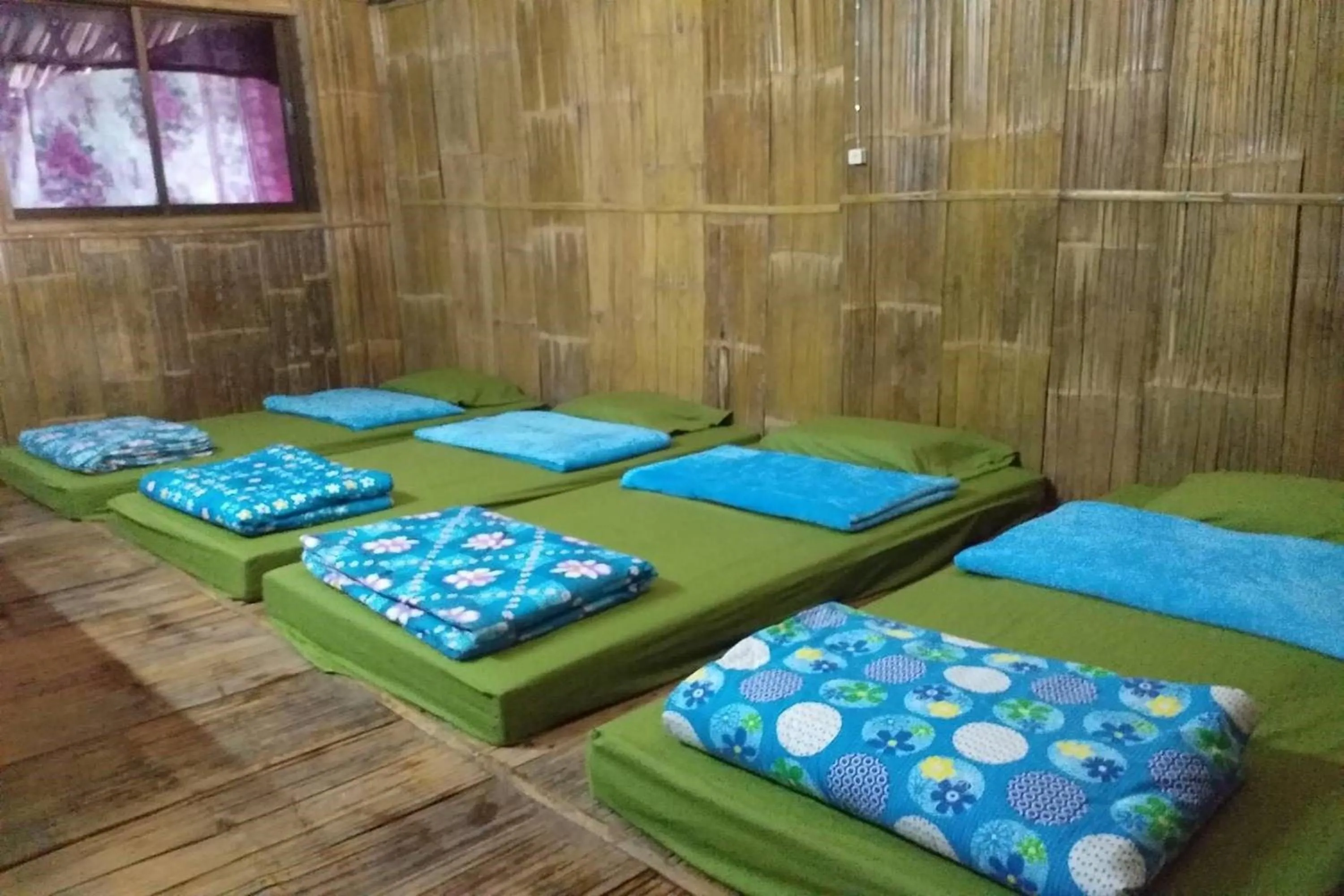 Bed in Doi PuMuen LAHU Homestay