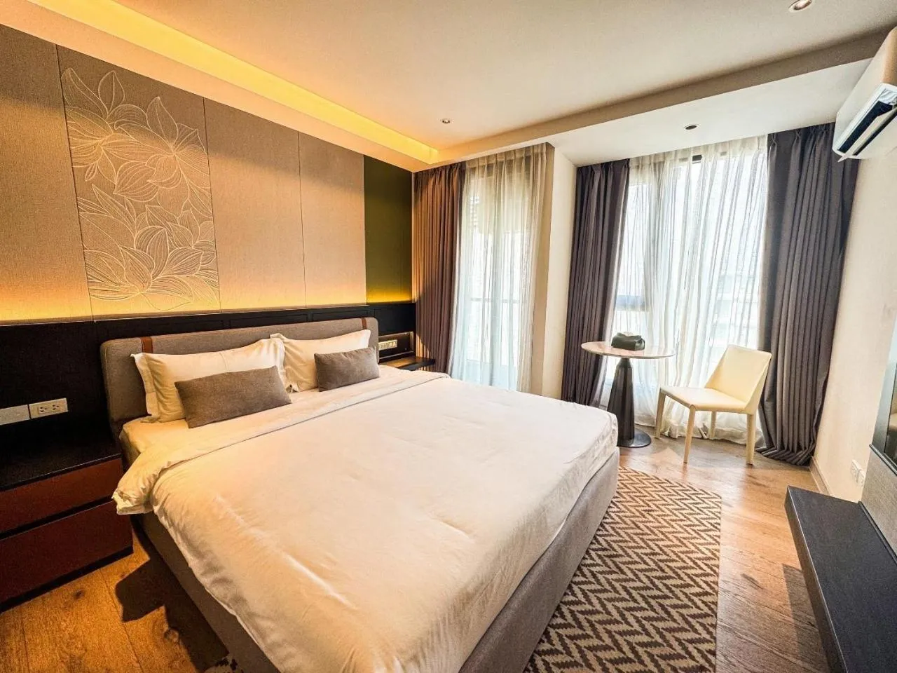 Bed in Cha Chiangmai Luxury