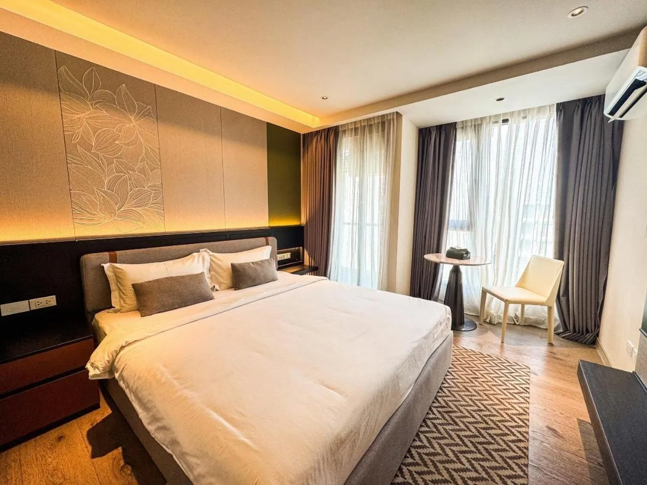 Bed in Cha Chiangmai Luxury