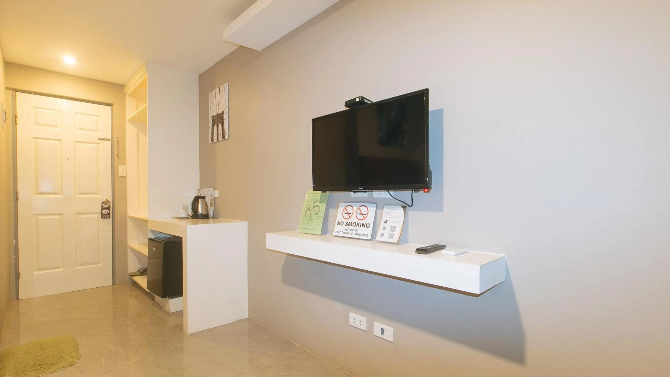 TV and multimedia in RedDoorz Plus at Seventy Five Inn Near Manila Airport