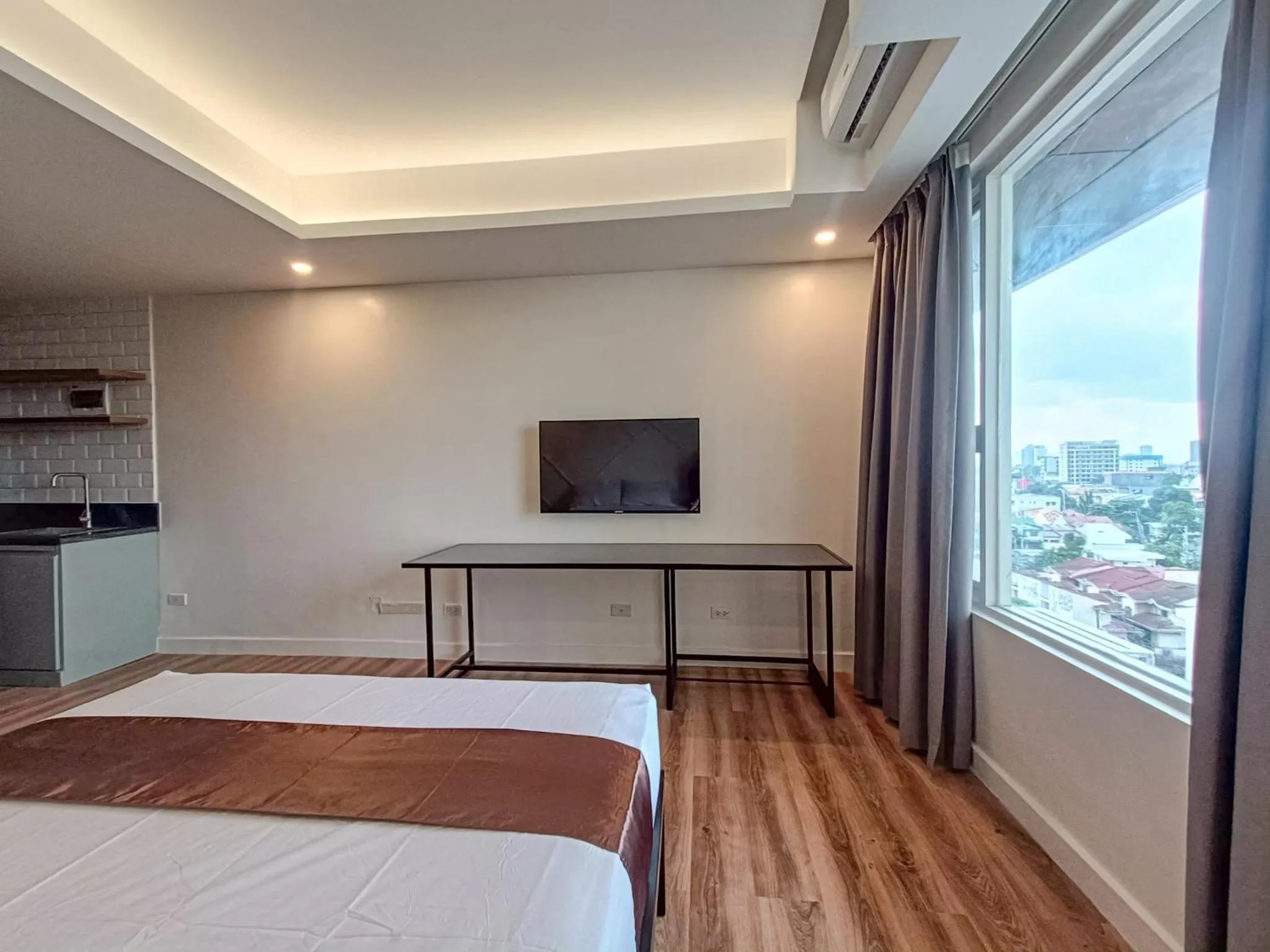 Bed in Wesfame Suites