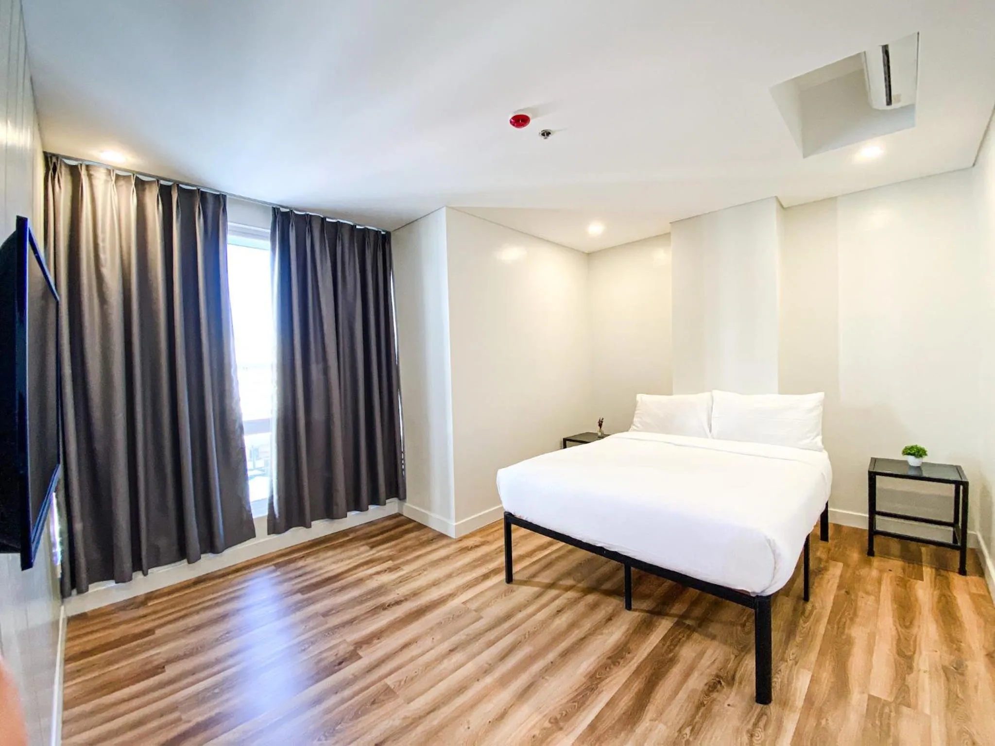 Bed in Wesfame Suites