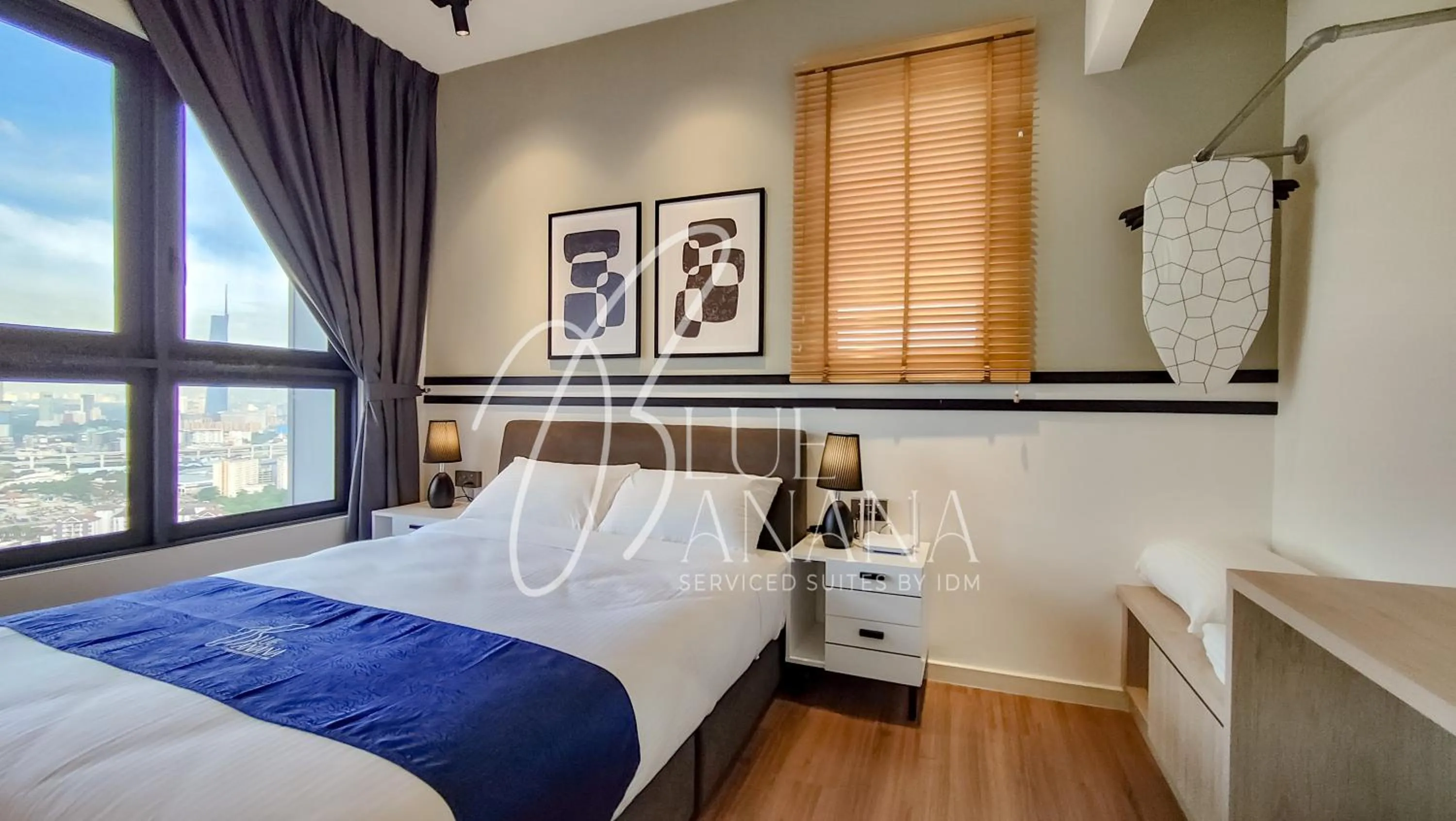 Bed in M Vertica Premier Suites by BlueBanana