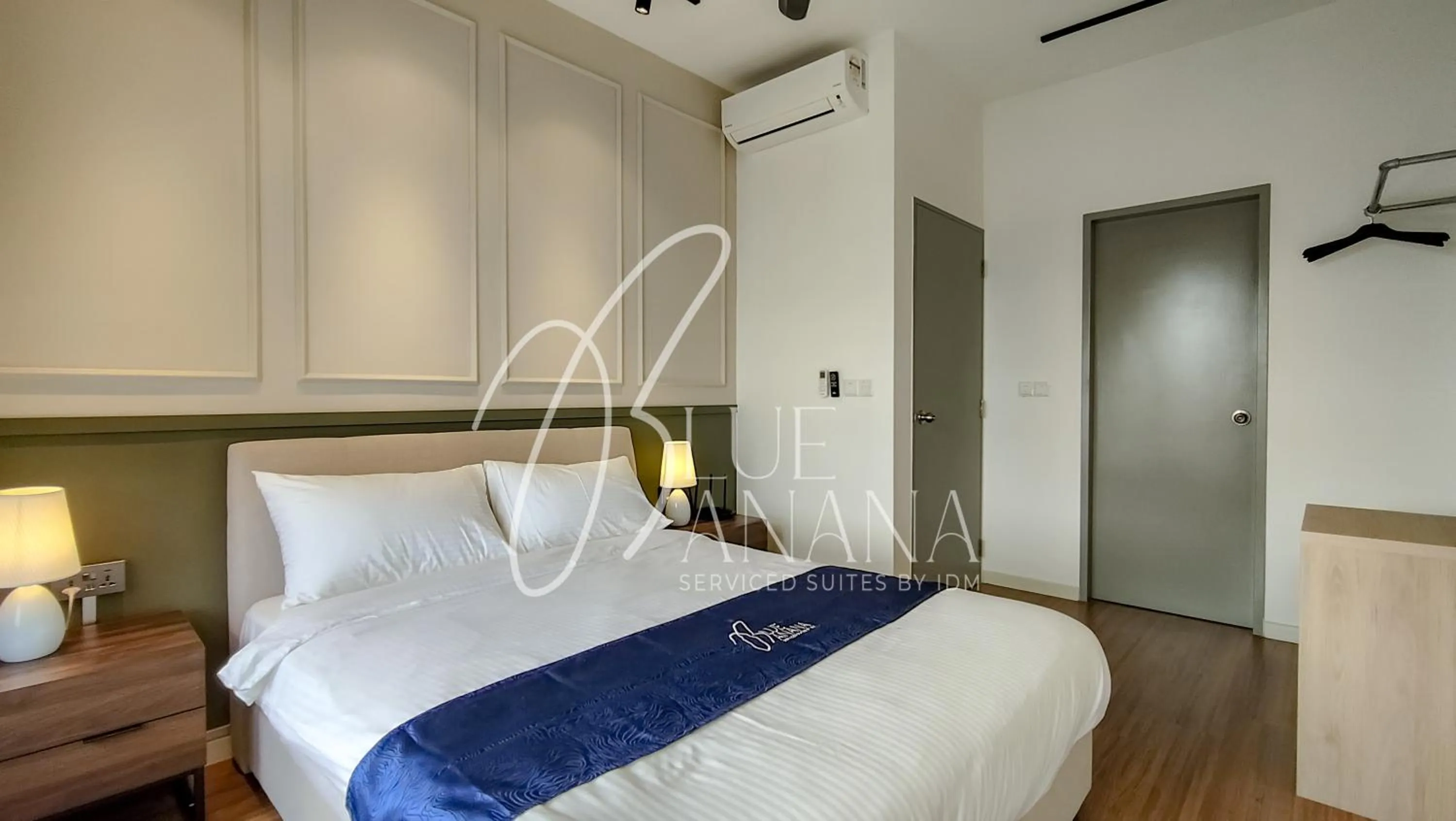 Bed in M Vertica Premier Suites by BlueBanana