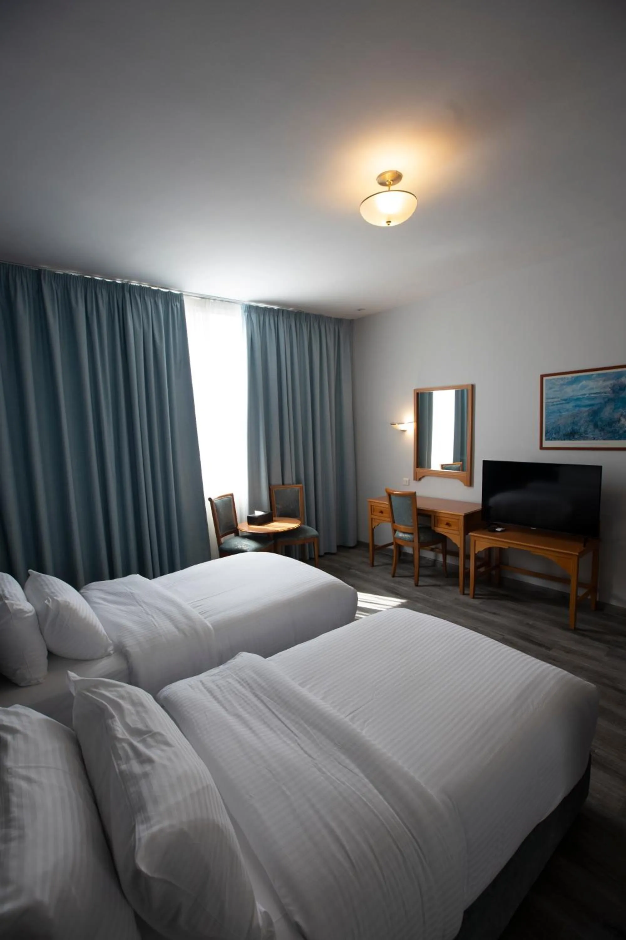 Bed in El Sheikh Suites Hotel