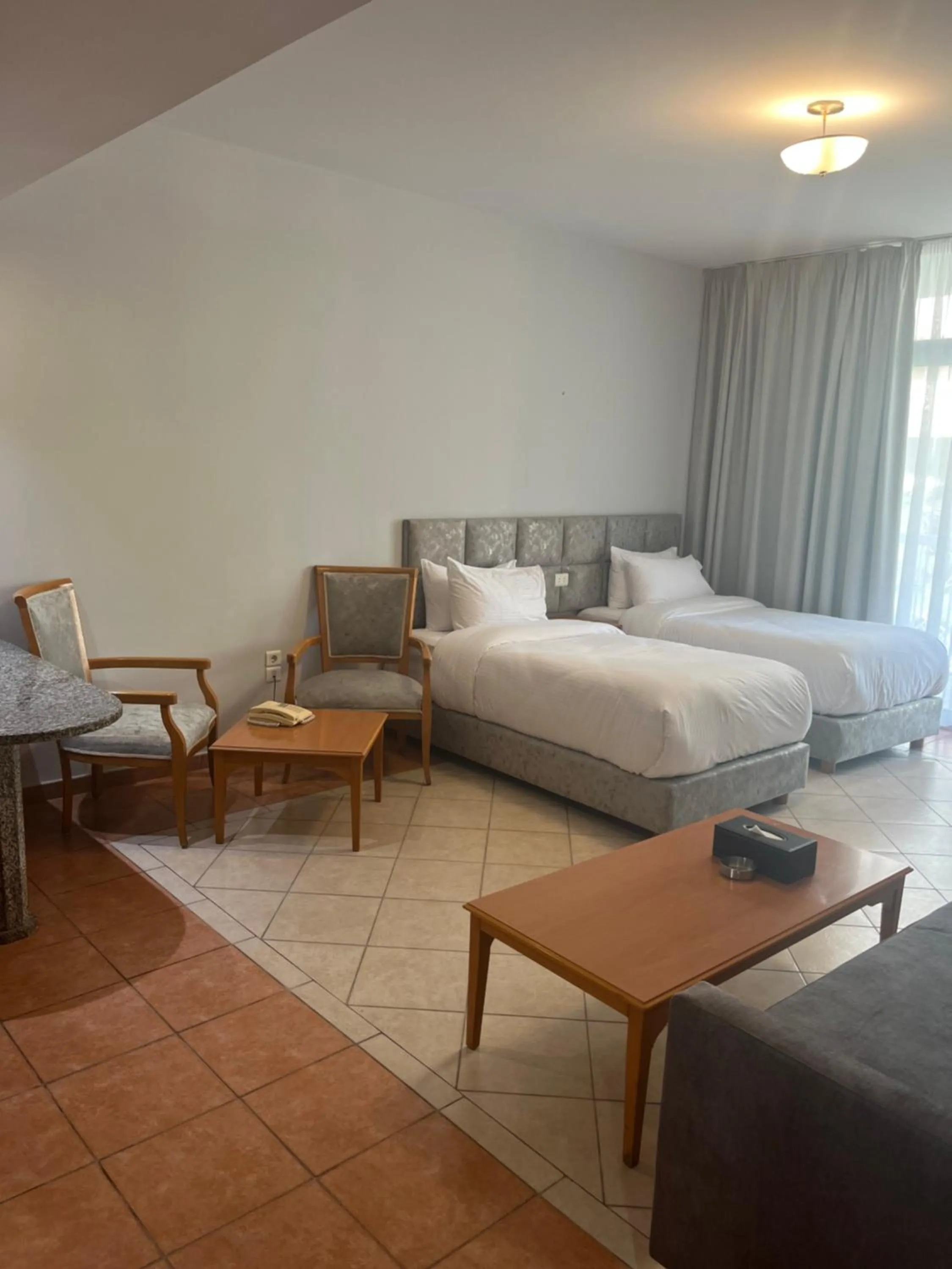 Bed in El Sheikh Suites Hotel